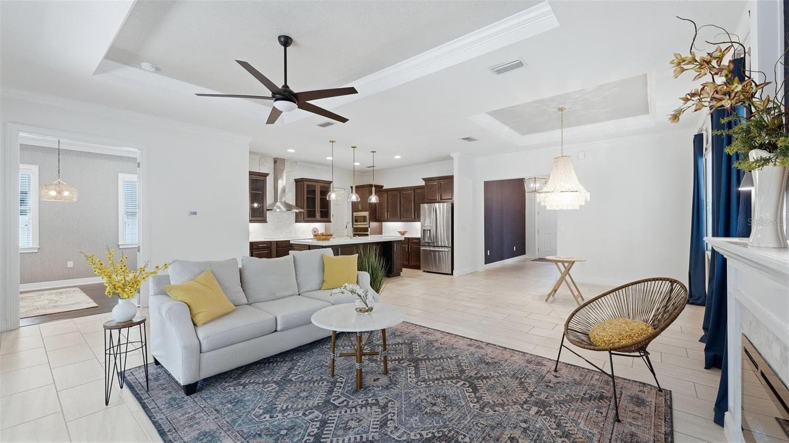 Kitchen opens to dining area & living room with flex room & full first floor bath - 1850 MAGNOLIA ST, SARASOTA