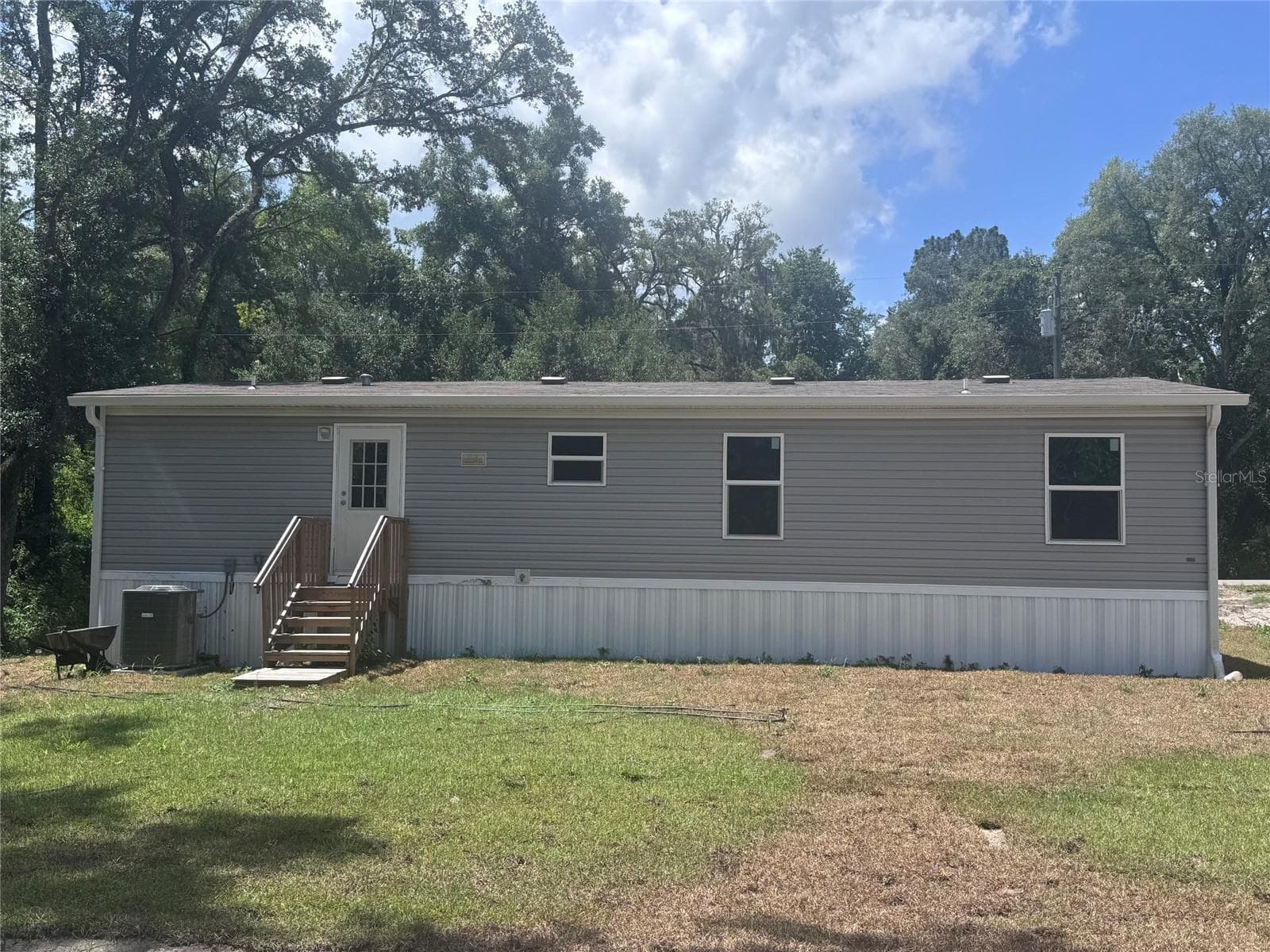 Manufactured Home at 11801 NW 20TH ST, OCALA, photo 2 of 13