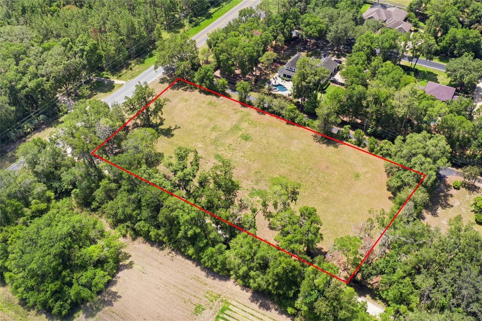 Aerial view with approx lot lines in red. - 1224 NW 143RD ST, NEWBERRY