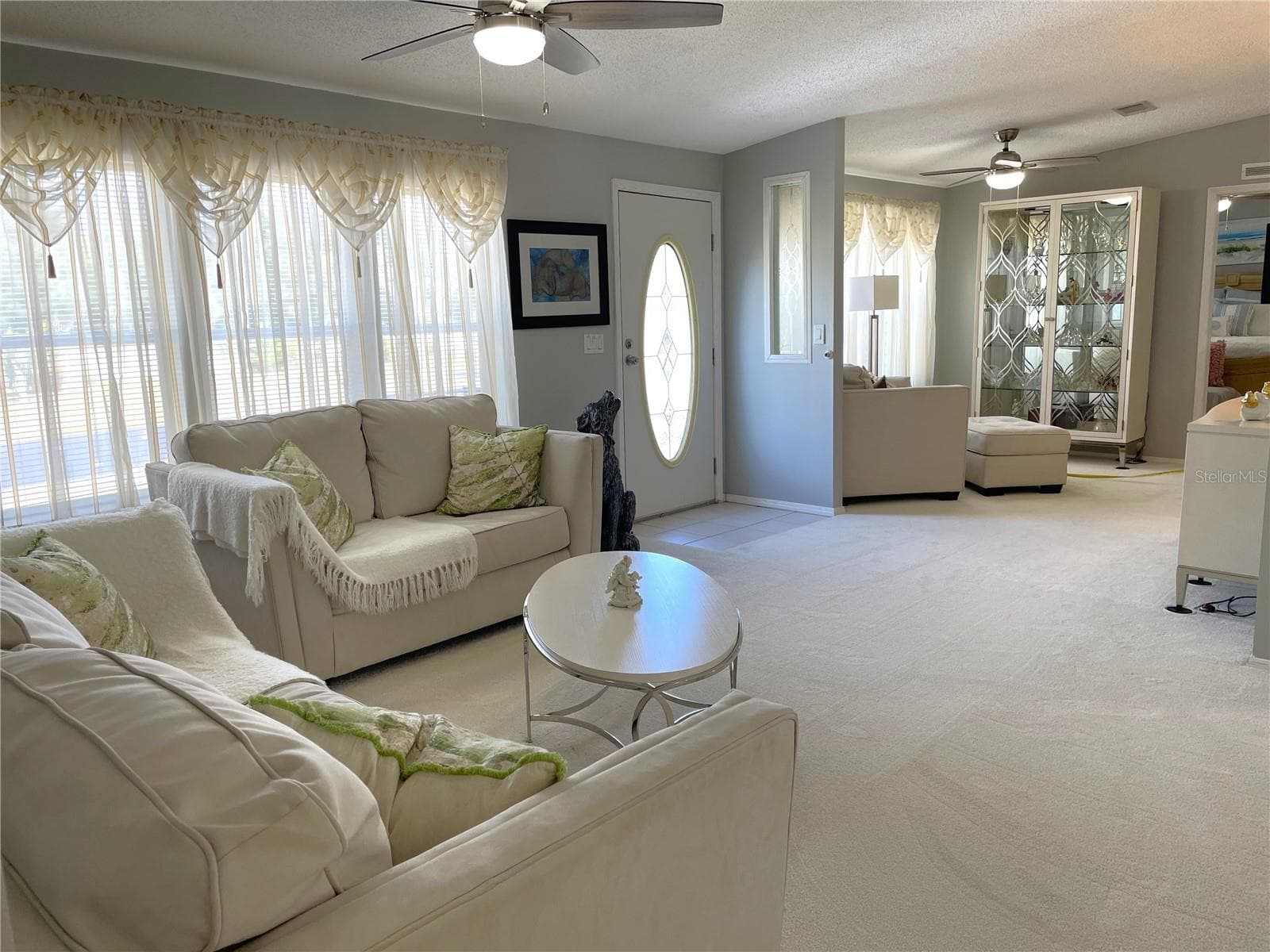 Large Living room/flex space in the front of the home - 24437 HARBORVIEW RD #70, PORT CHARLOTTE