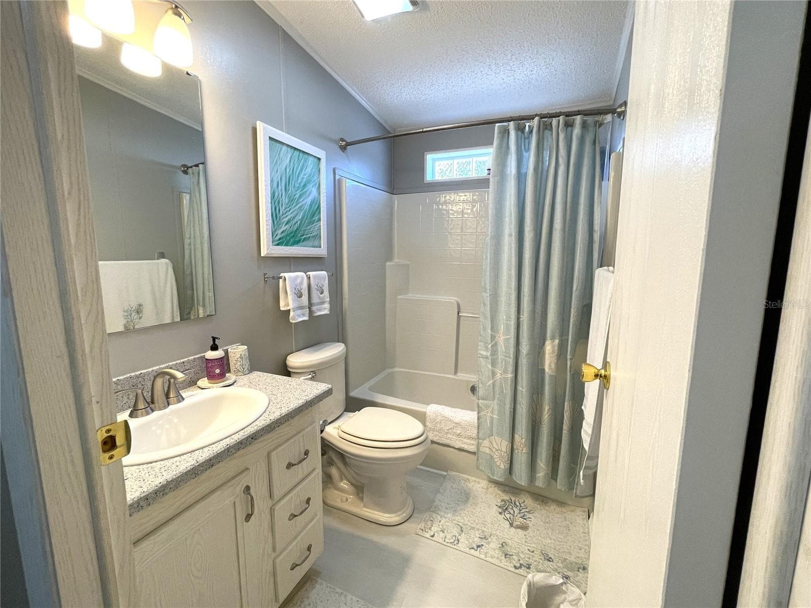 Guest Bathroom with tub/shower - 24437 HARBORVIEW RD #70, PORT CHARLOTTE