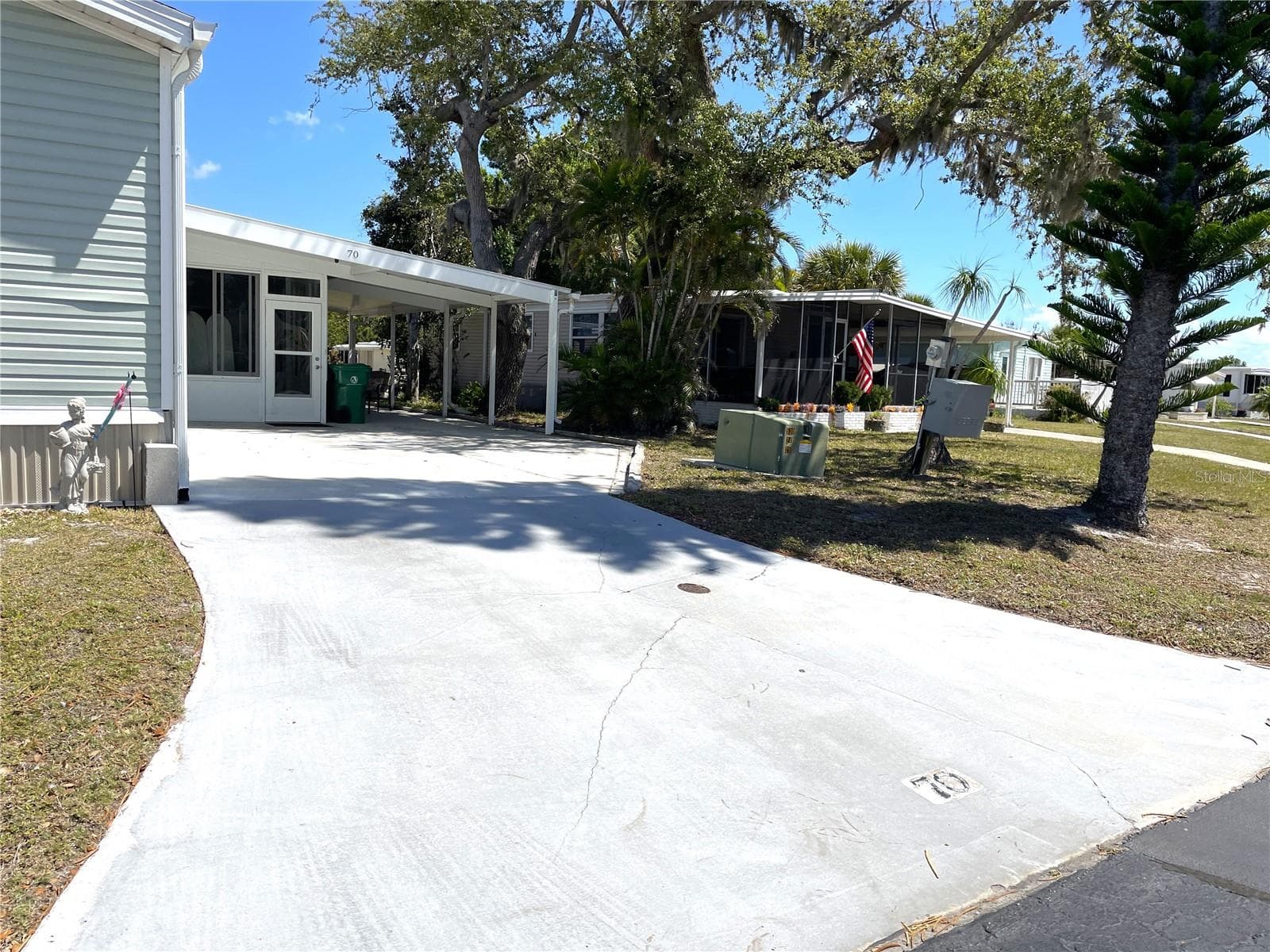 Long Driveway and Carport - 24437 HARBORVIEW RD #70, PORT CHARLOTTE