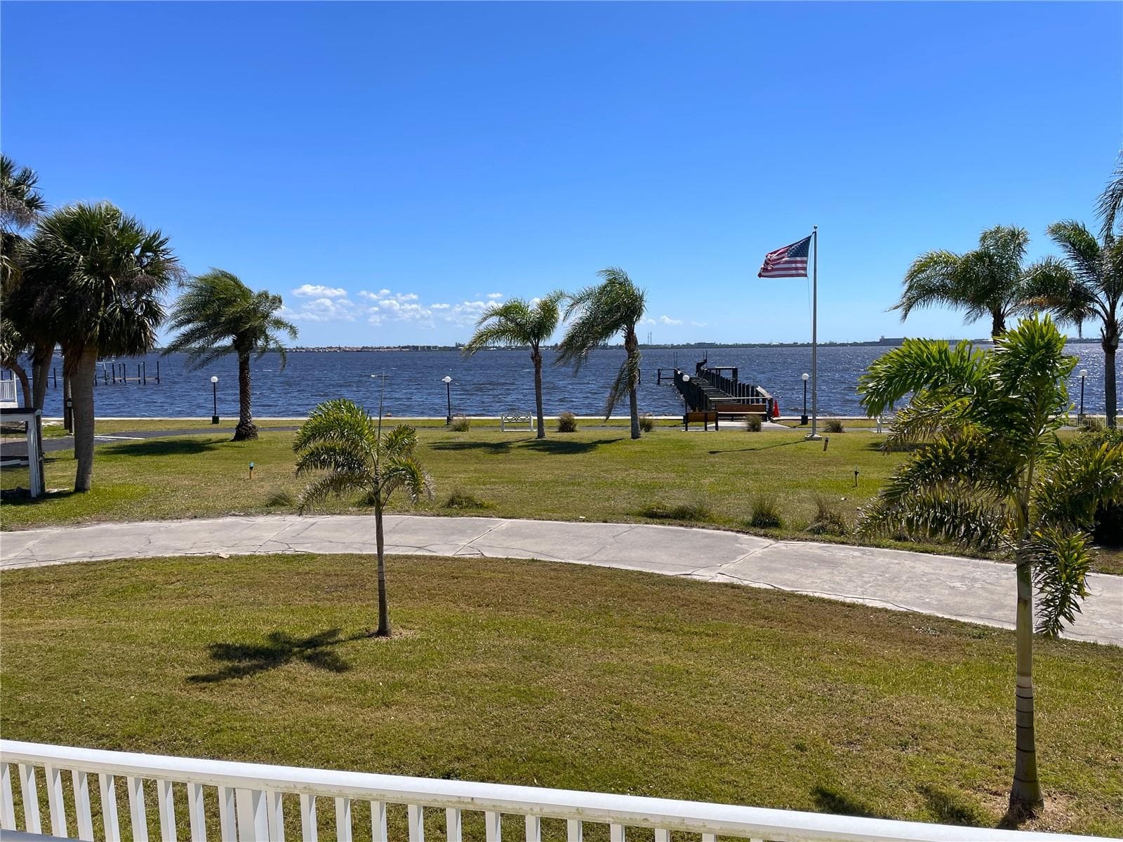View from the Clubhouse. The pier is being replaced this year. - 24437 HARBORVIEW RD #70, PORT CHARLOTTE