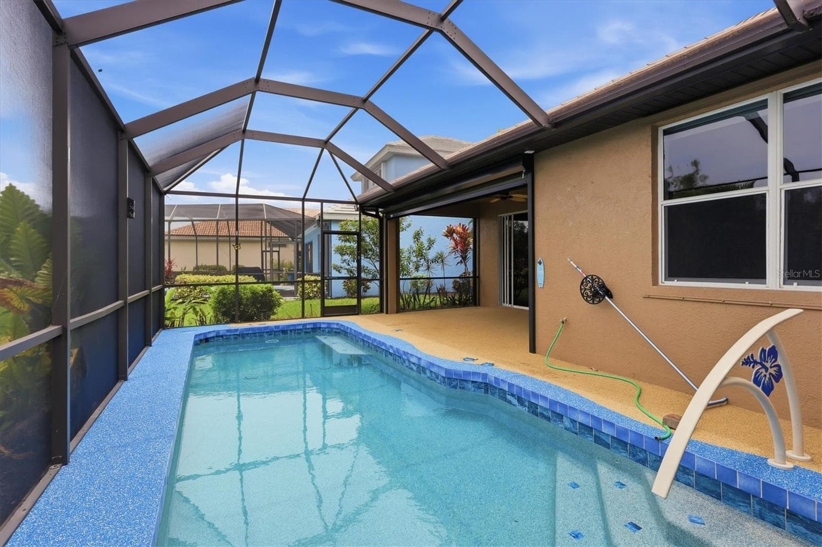 Cool touch Pool Handle with Hibiscus Flower - 3275 OSPREY LN, PORT CHARLOTTE