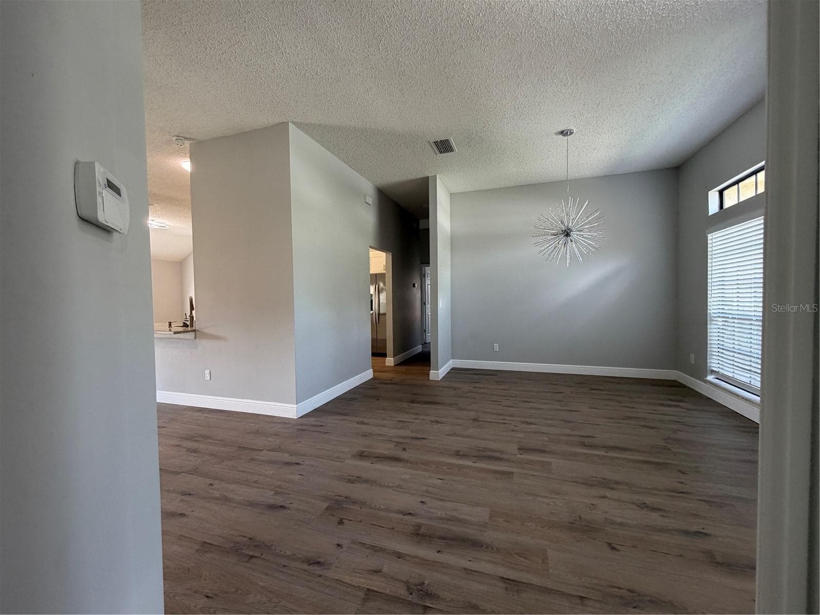 new vinyl flooring - 1009 CORKWOOD DR, OVIEDO