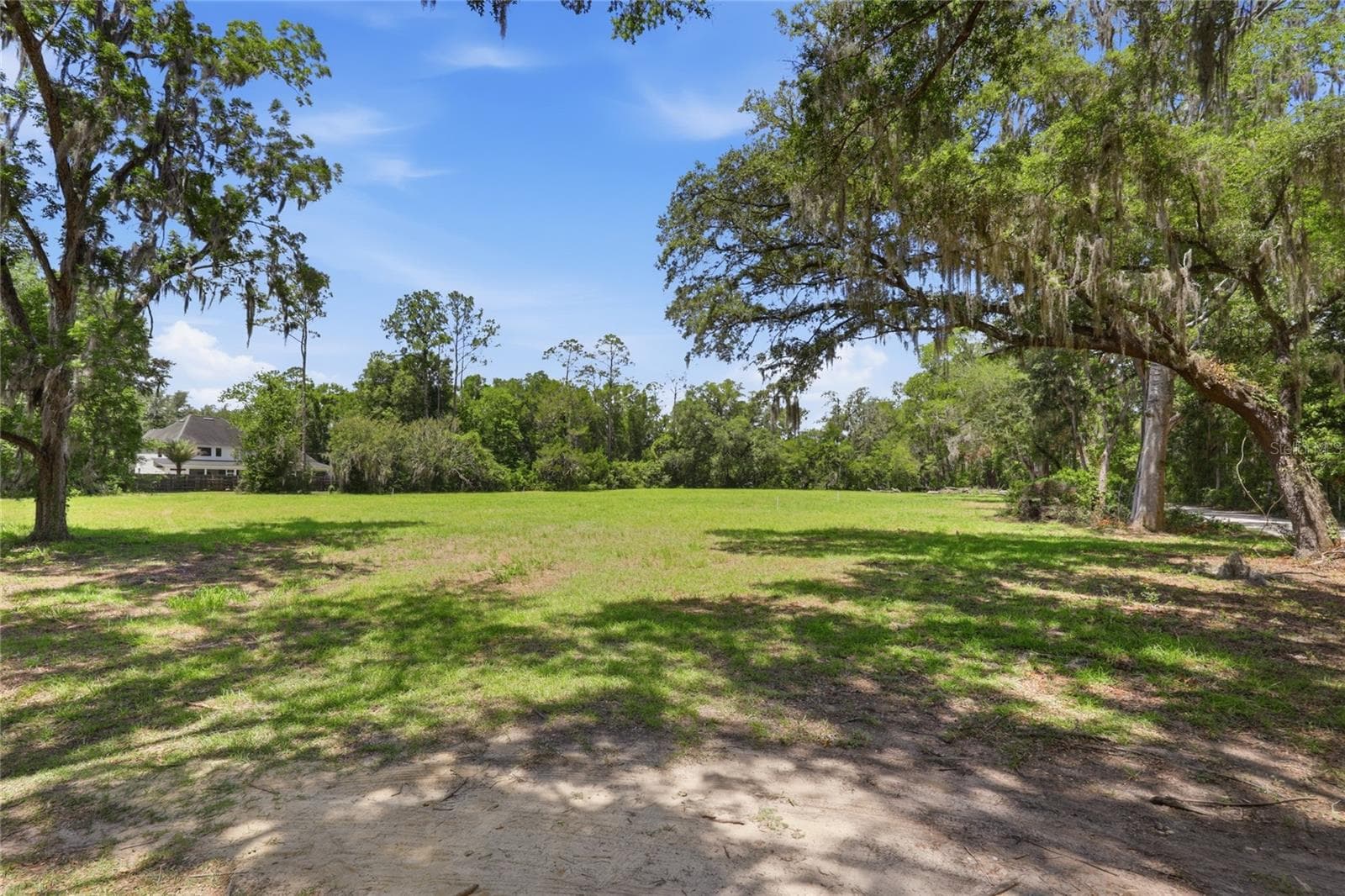 Beautiful 2.2 acre lot with old Florida charm, perfect spot for your dream home with no HOA and close to amenities. - 1224 NW 143RD ST, NEWBERRY