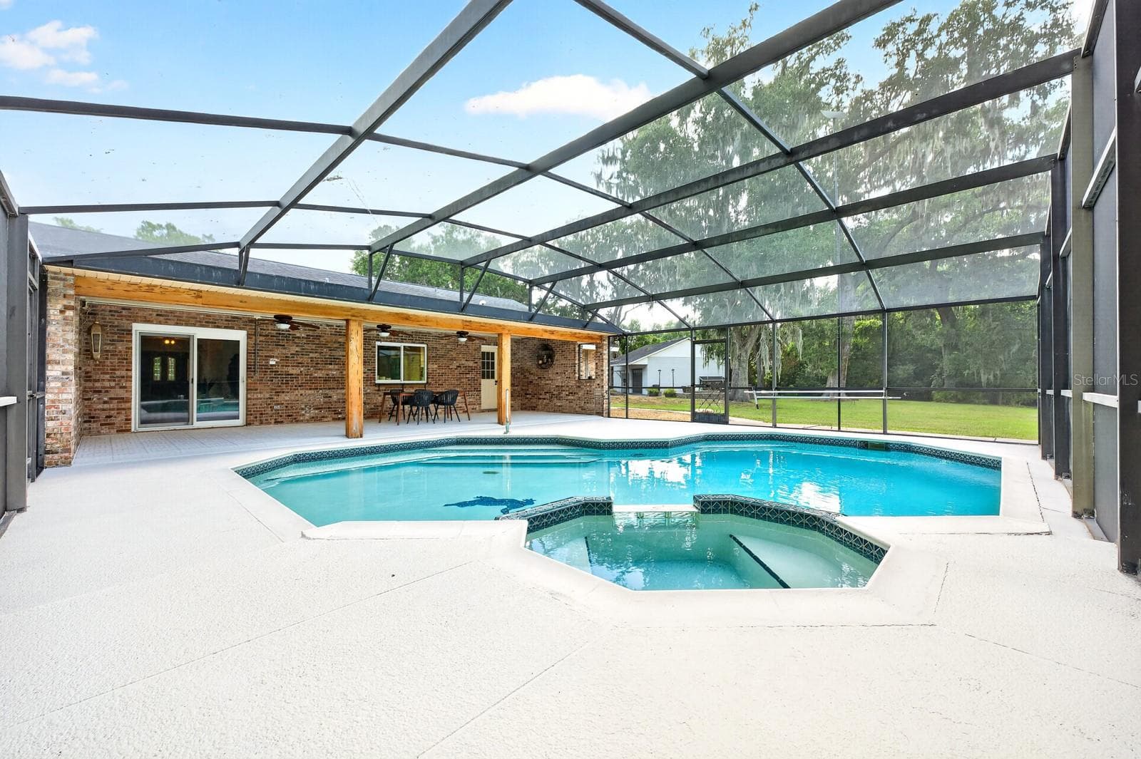Private pool and spa, screened for year-round enjoyment. - 1600 E 10TH ST, ST CLOUD