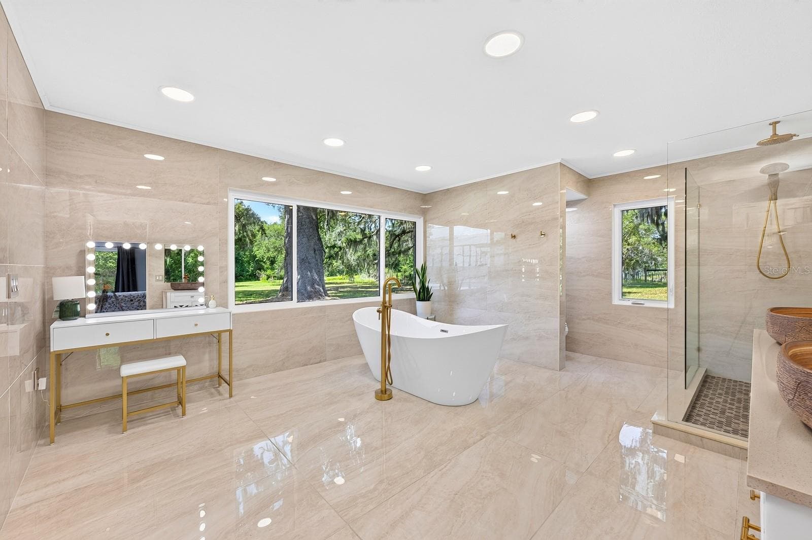 Stepping into your private en-suite bath is like stepping into a spa. - 1600 E 10TH ST, ST CLOUD