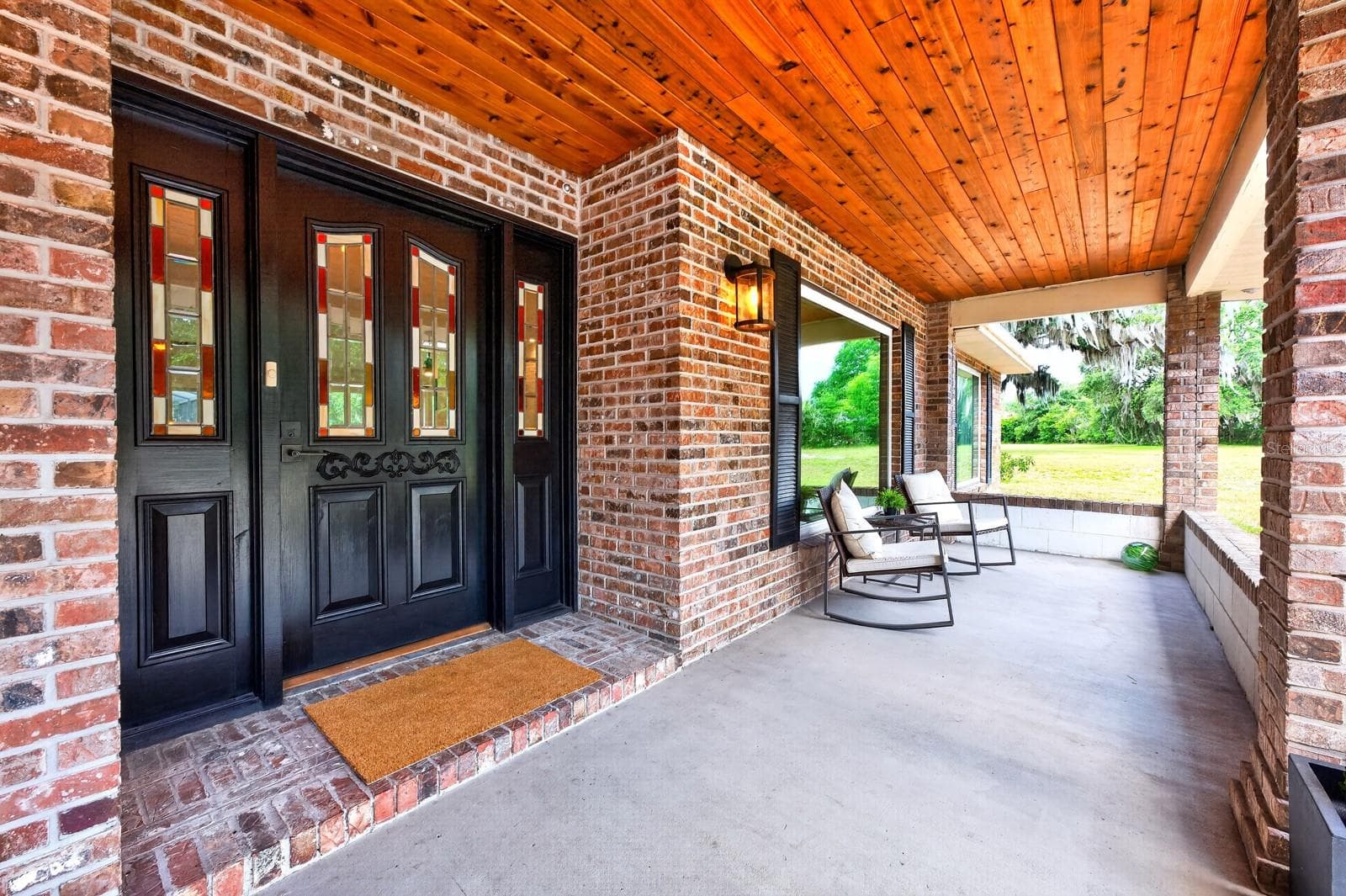 Enjoy a covered front porch entry. - 1600 E 10TH ST, ST CLOUD