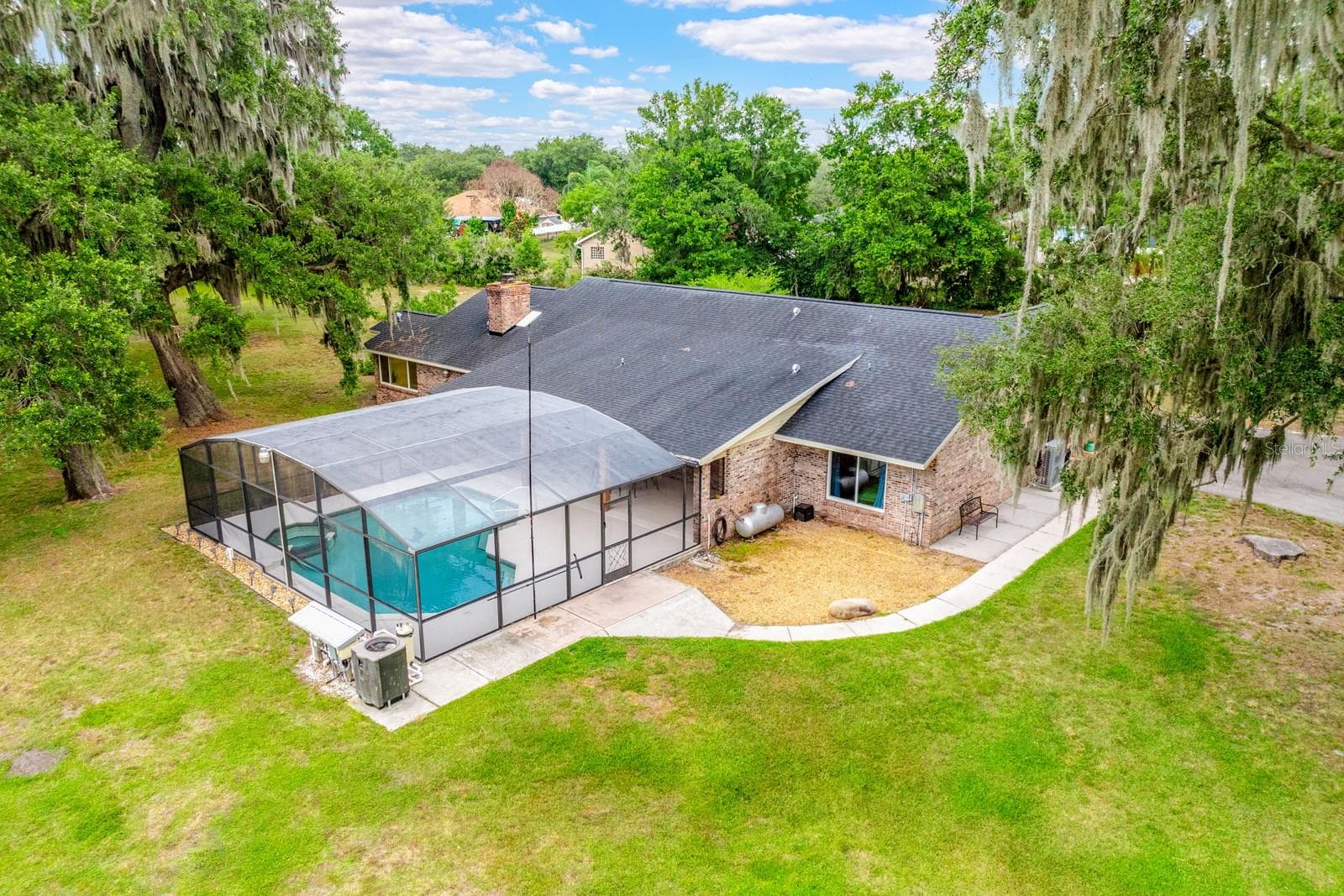 Aerial view of the pool/backyard. - 1600 E 10TH ST, ST CLOUD