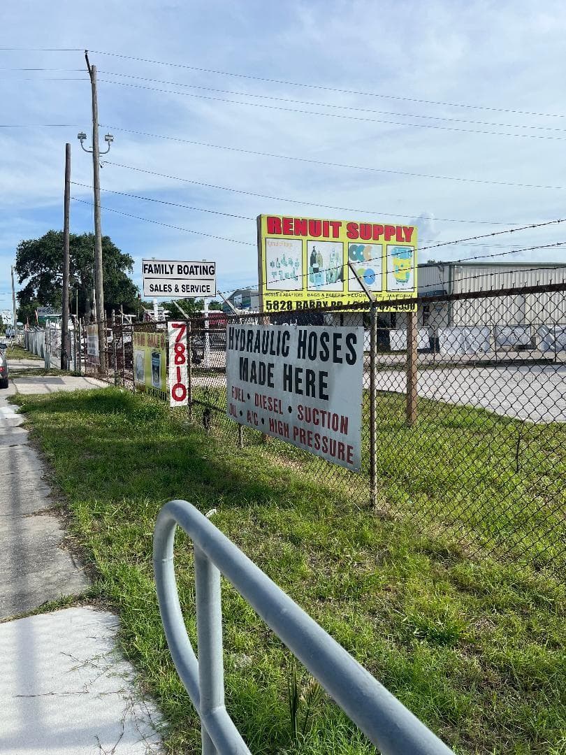Front fence signage - 7810 ANDERSON RD, TAMPA