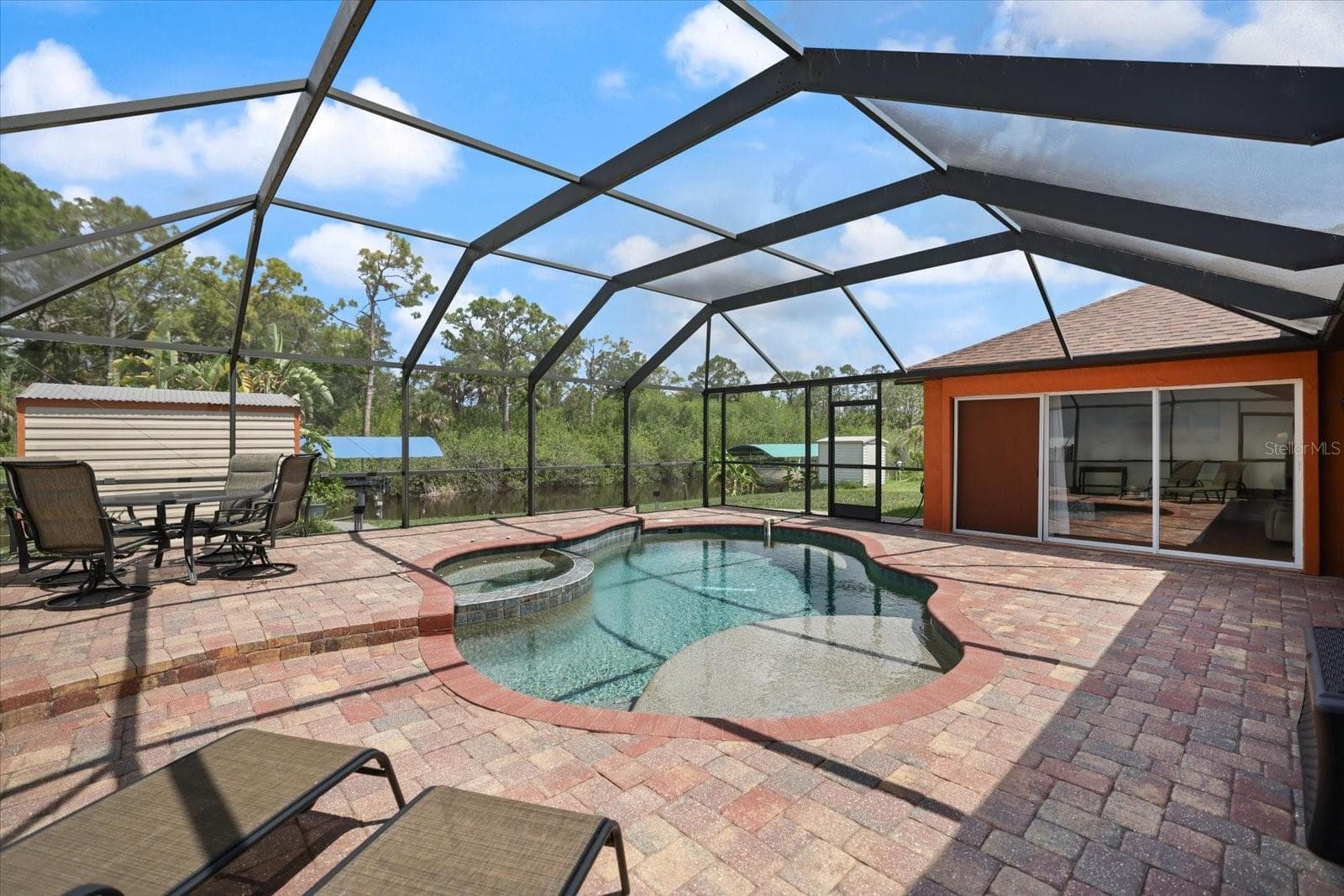 Heated Pool and Spa. Plus Pocket Slider Doors lead to Living Room - 20 CORY ST, PORT CHARLOTTE