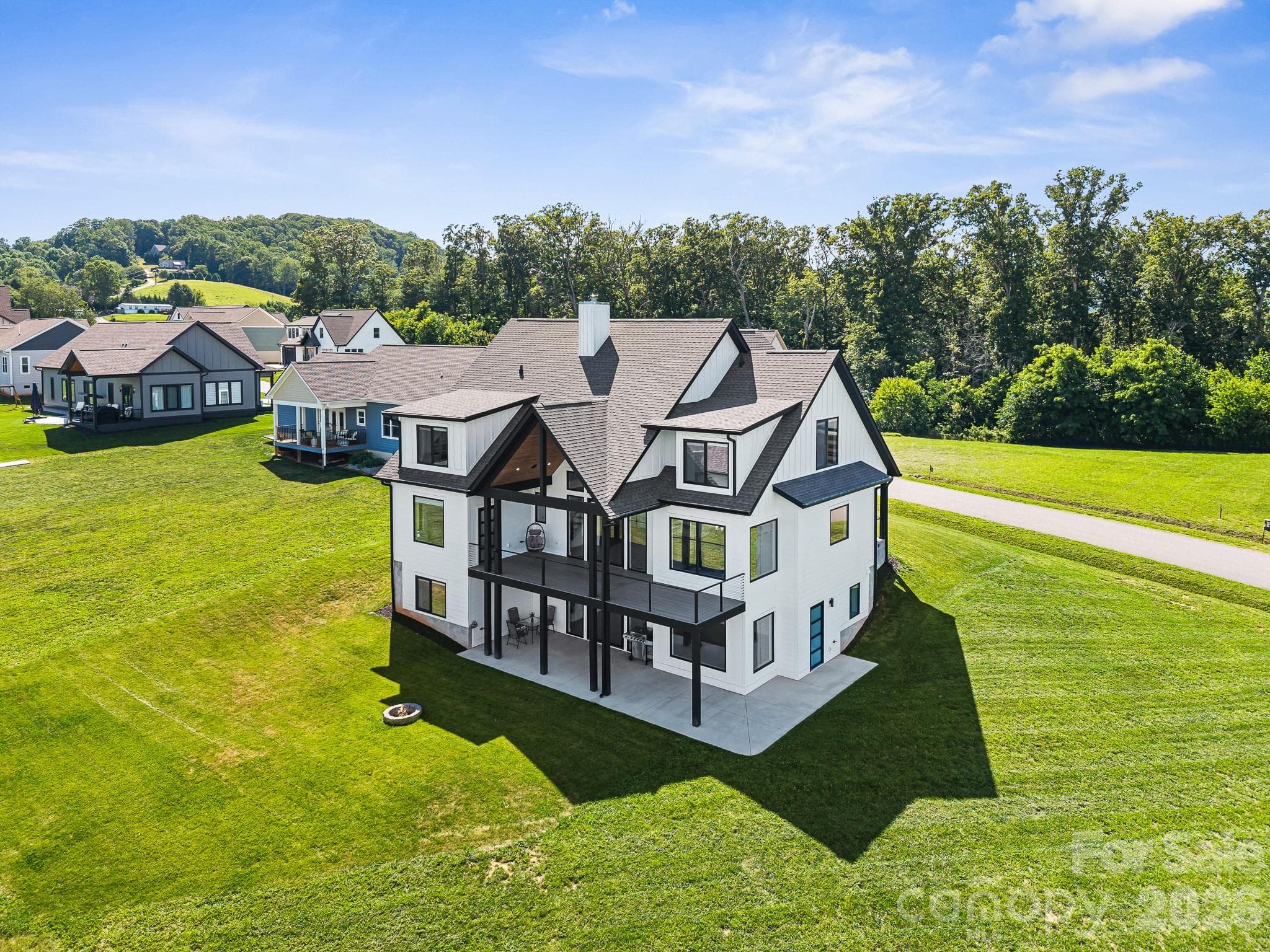 Single Family Residence at 1026 Hillside Ridge Road, Candler, photo 4 of 48