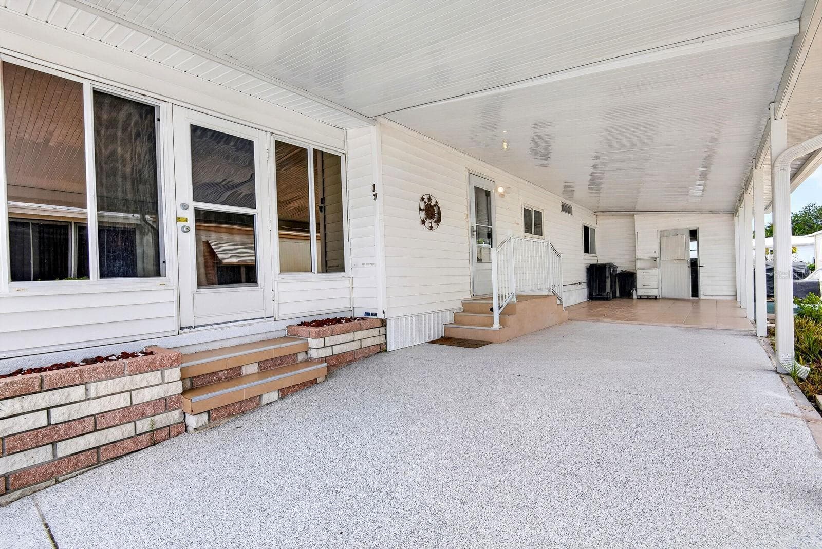 large carport area - 2107 PALMA SOLA BLVD #17, BRADENTON