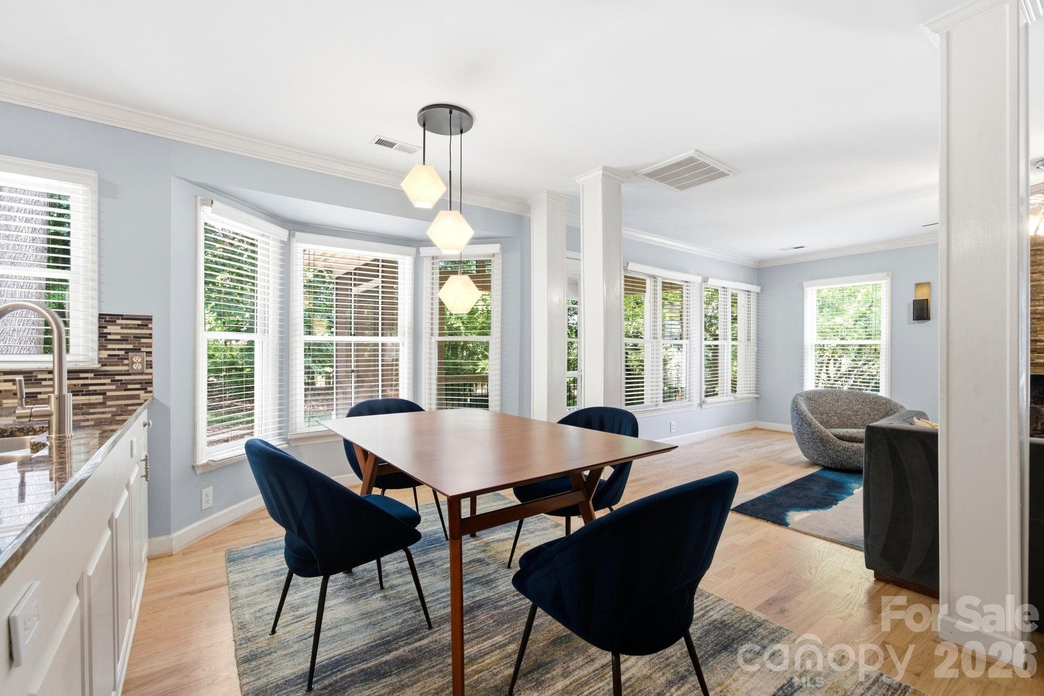 Dining Area - nice open area from kitchen to dining area and living room which makes it great for entertaining. Tons of natural light and backyard scenery - 503 Wyre Forest Court, Charlotte