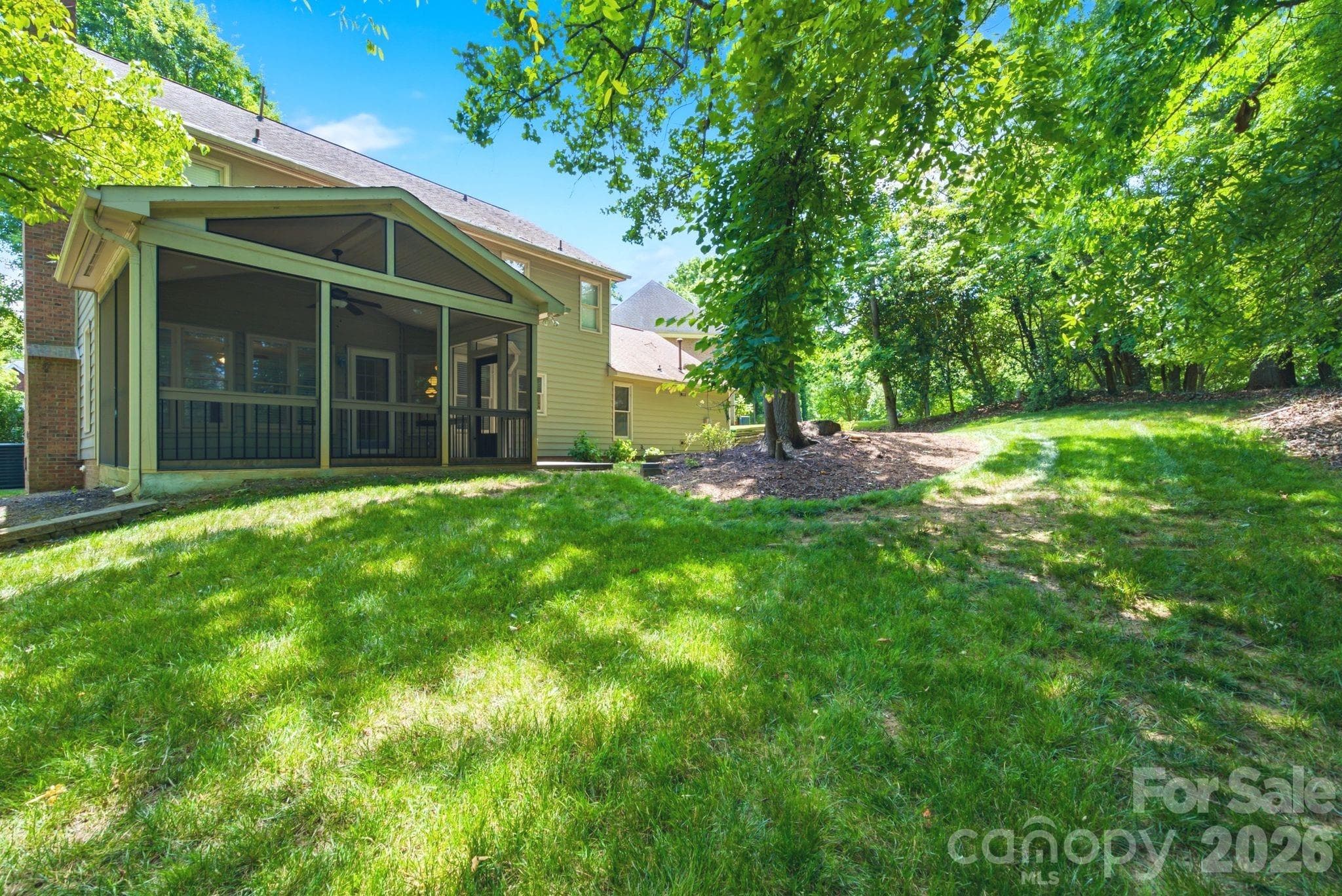 Backyard and view of screened in porch - 503 Wyre Forest Court, Charlotte