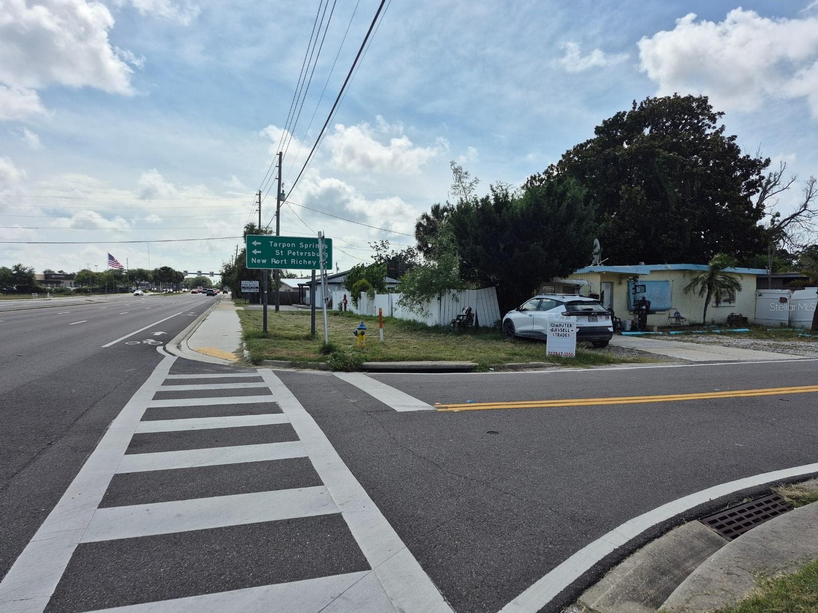 Facing West across Flamingo Drive on North side of SR 54, property to the right. - 4007 FLAMINGO DR, NEW PORT RICHEY