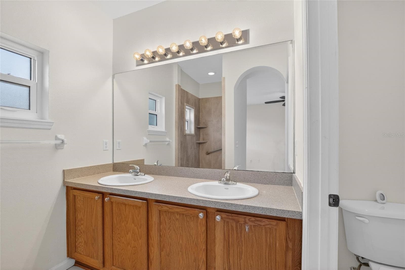 Primary bathroom with dual sinks. - 307 SUMMER CLOUDS PL, BRANDON