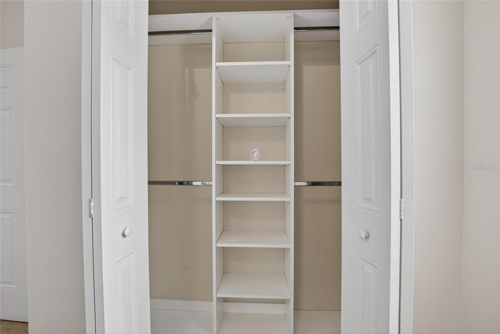 Bedroom 1 closet with built ins. - 307 SUMMER CLOUDS PL, BRANDON
