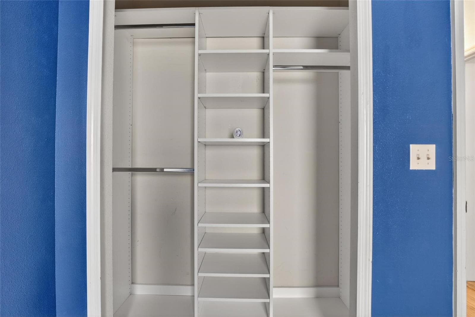 Bedroom 2 closet with built ins. - 307 SUMMER CLOUDS PL, BRANDON