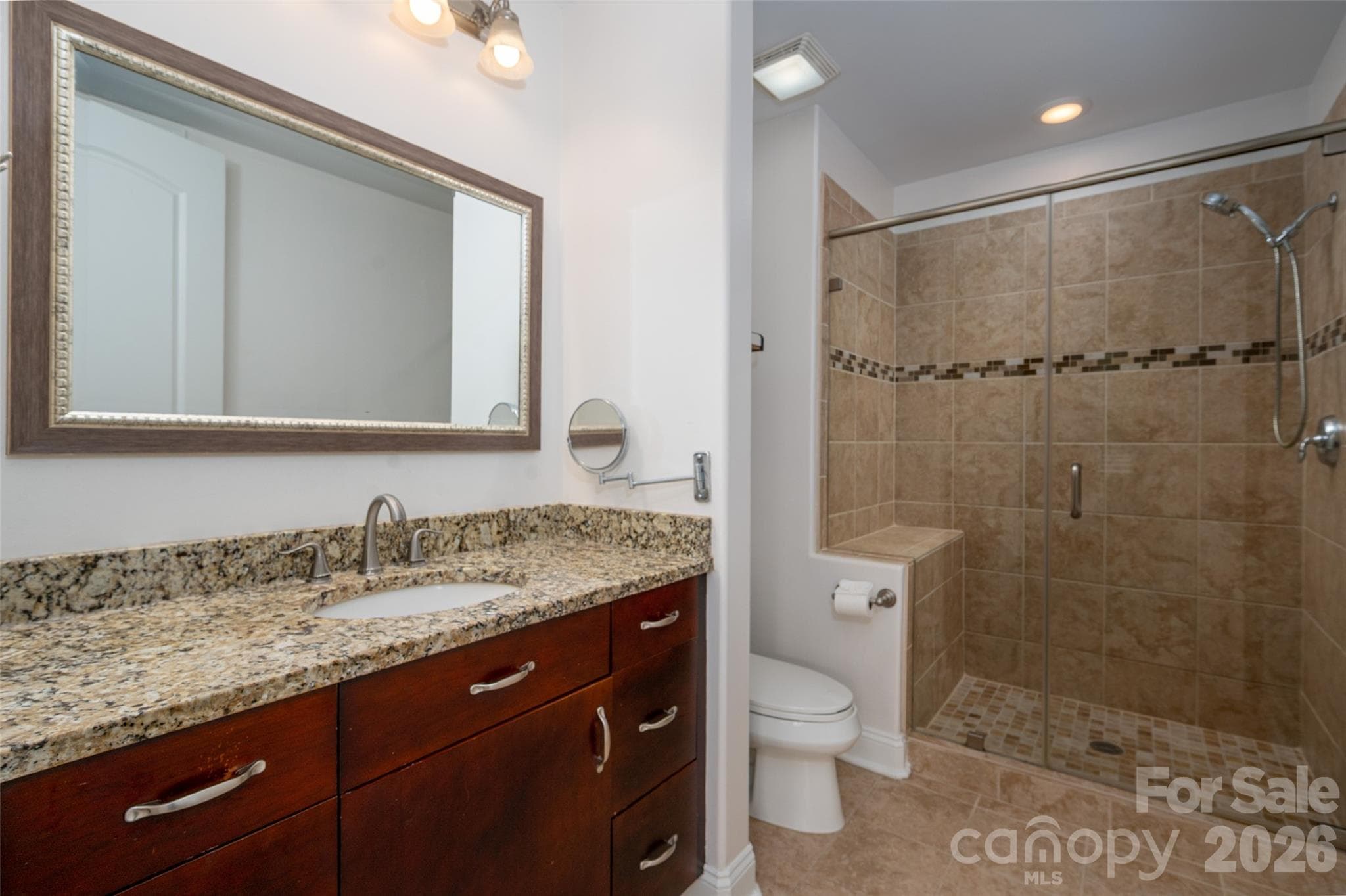 Large shower with a bench in your primary bath! - 4620 Piedmont Row Drive, Charlotte