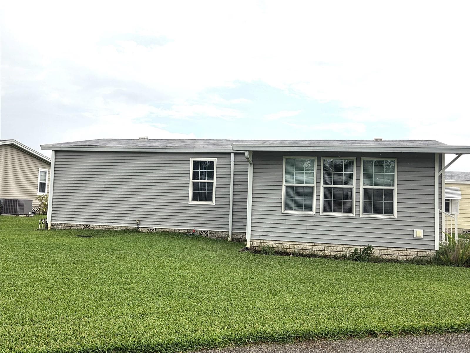 Manufactured Home at 332 VICTORIA DR, HAINES CITY, photo 2 of 92