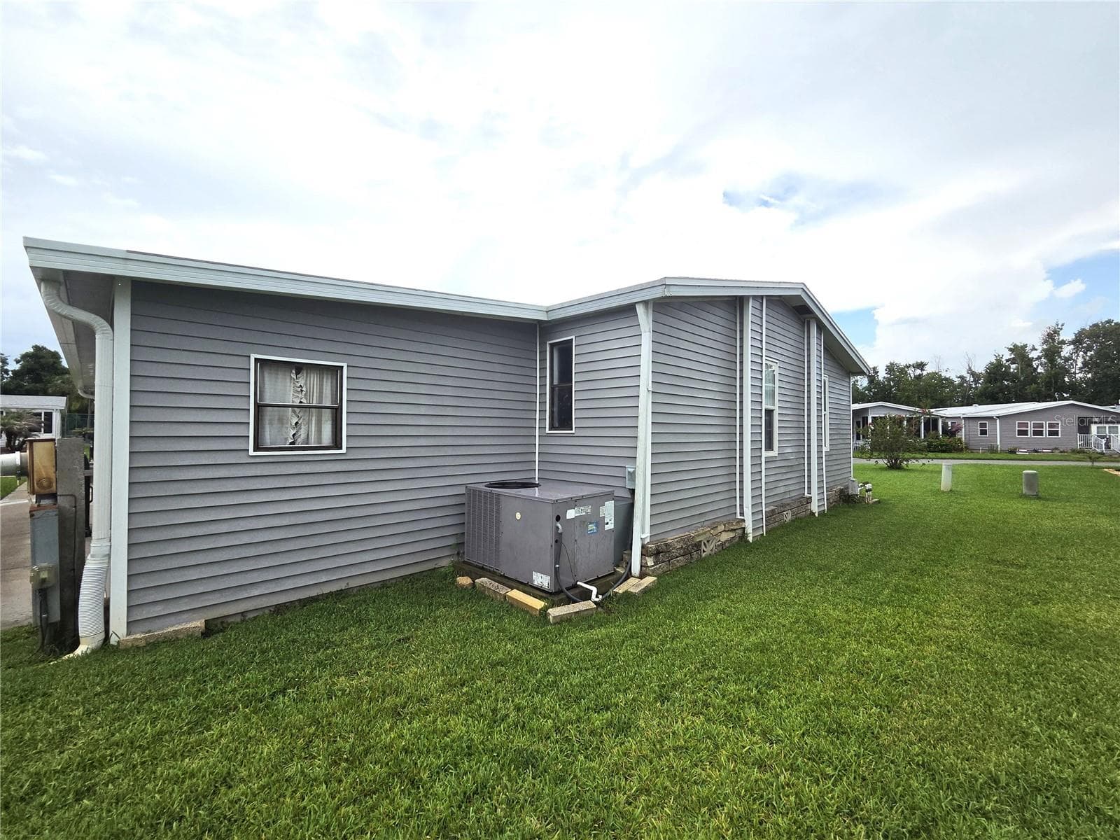 Manufactured Home at 332 VICTORIA DR, HAINES CITY, photo 7 of 92