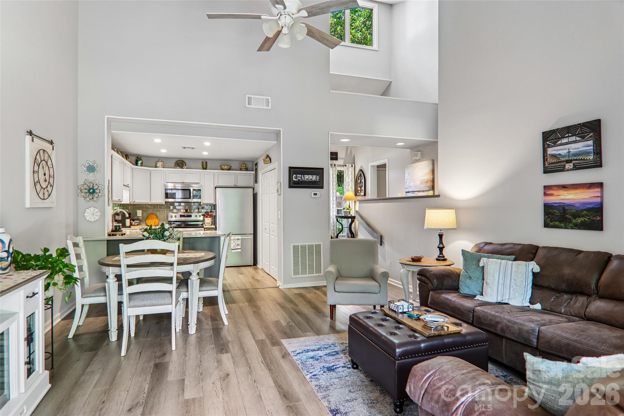 open concept from living room, dining area to the kitchen - 147 W Lake Drive S, Lake Lure