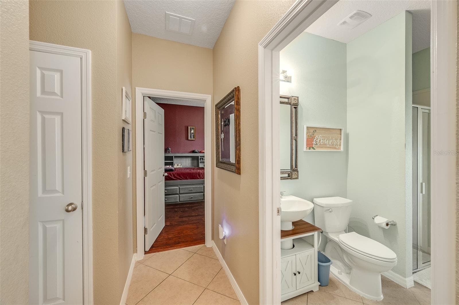 Across the hall from the laundry & garage; to the side of bedroom 1 - 2711 CYPRESS TREE TRL, ST CLOUD