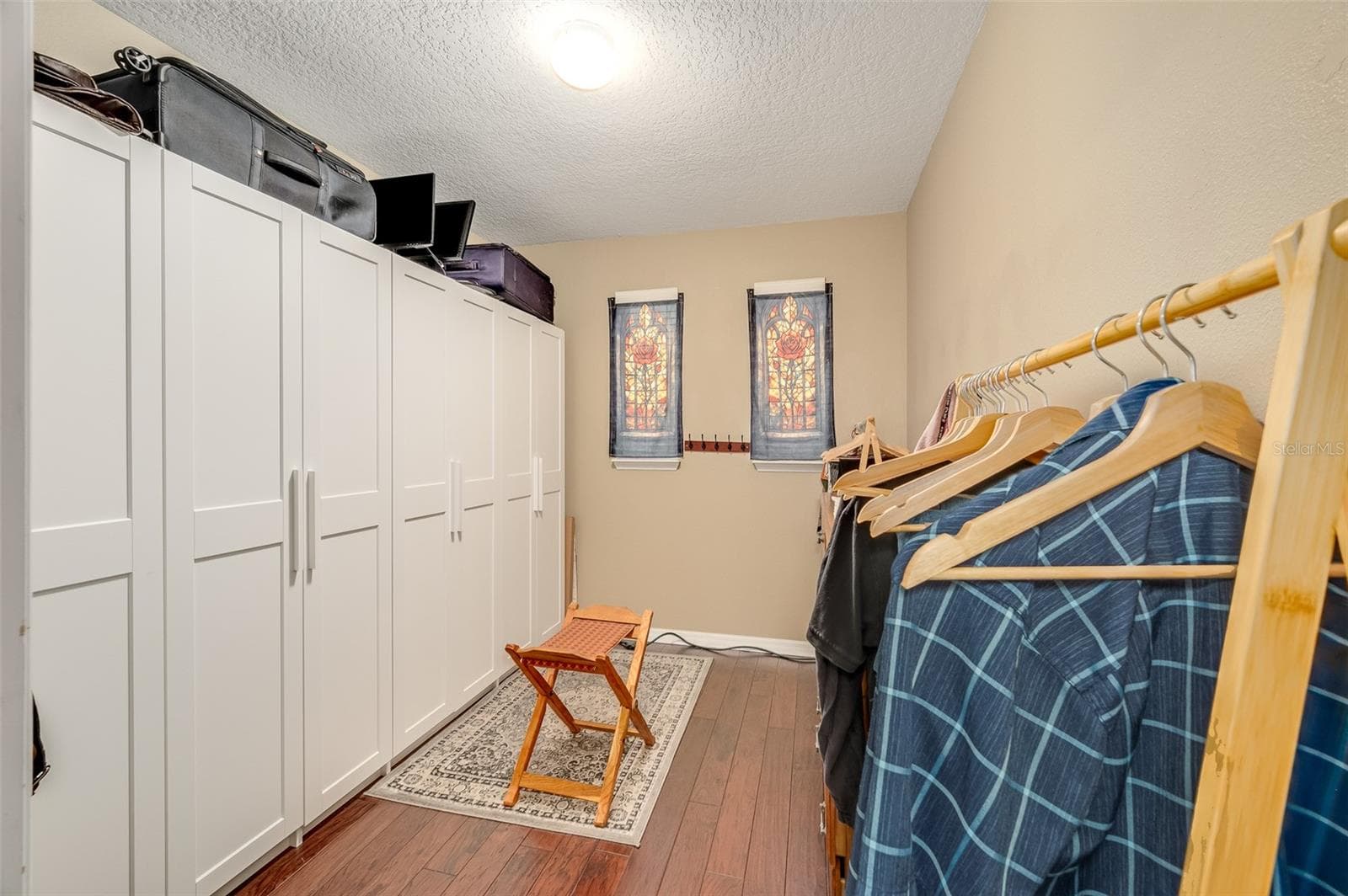 Primary bedroom walk-in closet - 2711 CYPRESS TREE TRL, ST CLOUD