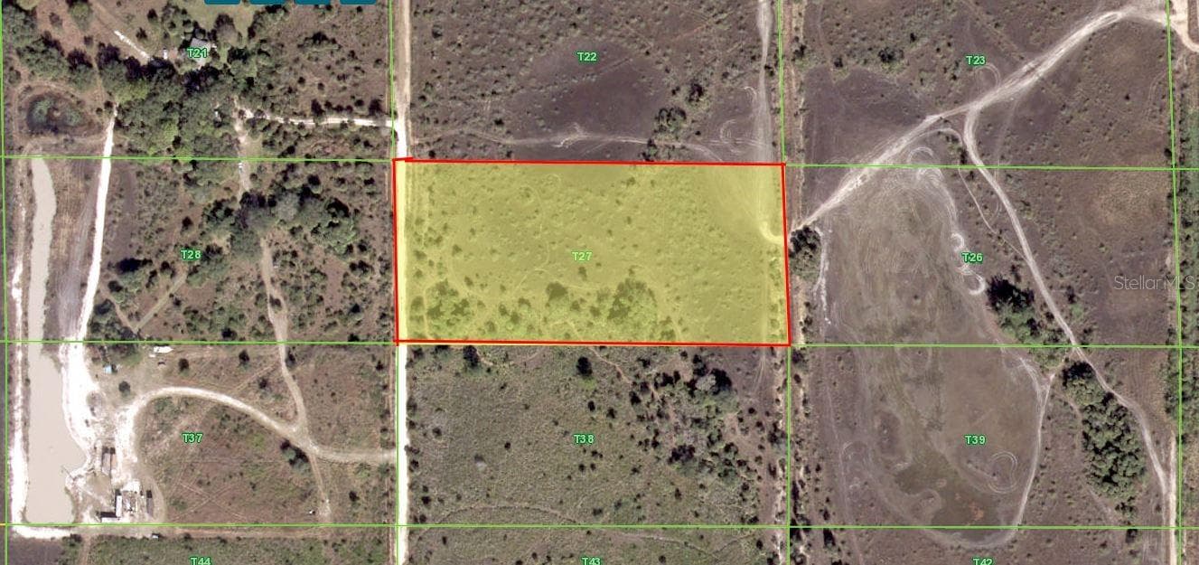 Aerial of the 5 acres. Electric service on the road. - 50670 BERMONT RD, PUNTA GORDA