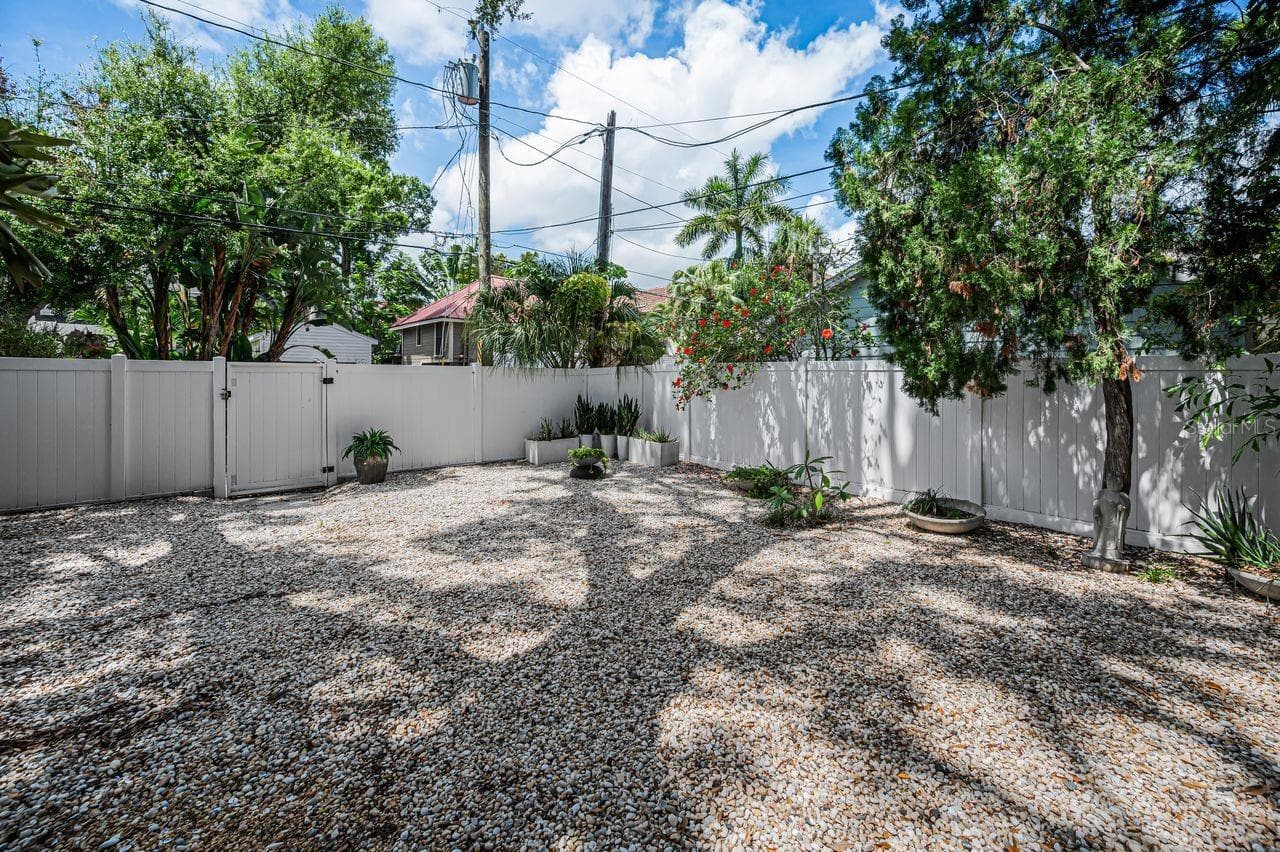 There is still plenty of room for backyard fun - open outdoor space ready for play, and those impromptu gatherings. - 732 NE OAK ST, ST PETERSBURG