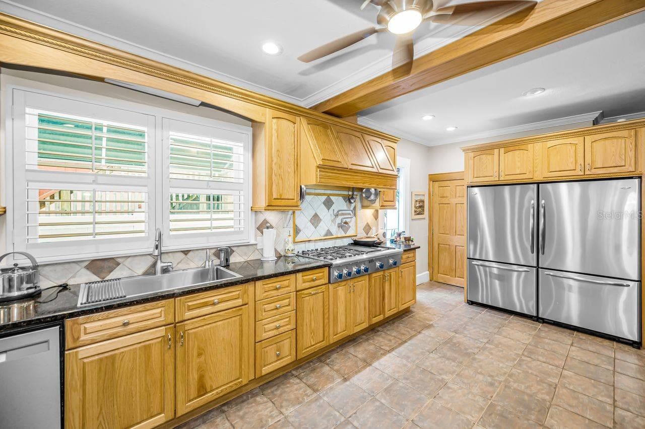 Your kitchen: 2 refrigerators, 2 ovens, 2 dish washers, perfect for any style of cooking. - 732 NE OAK ST, ST PETERSBURG