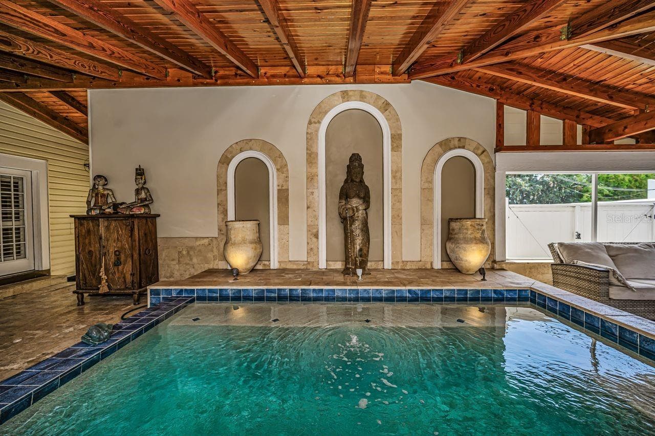 Heated salt-water with fountain. the kind of feature that instantly transforms a home into a private resort. - 732 NE OAK ST, ST PETERSBURG