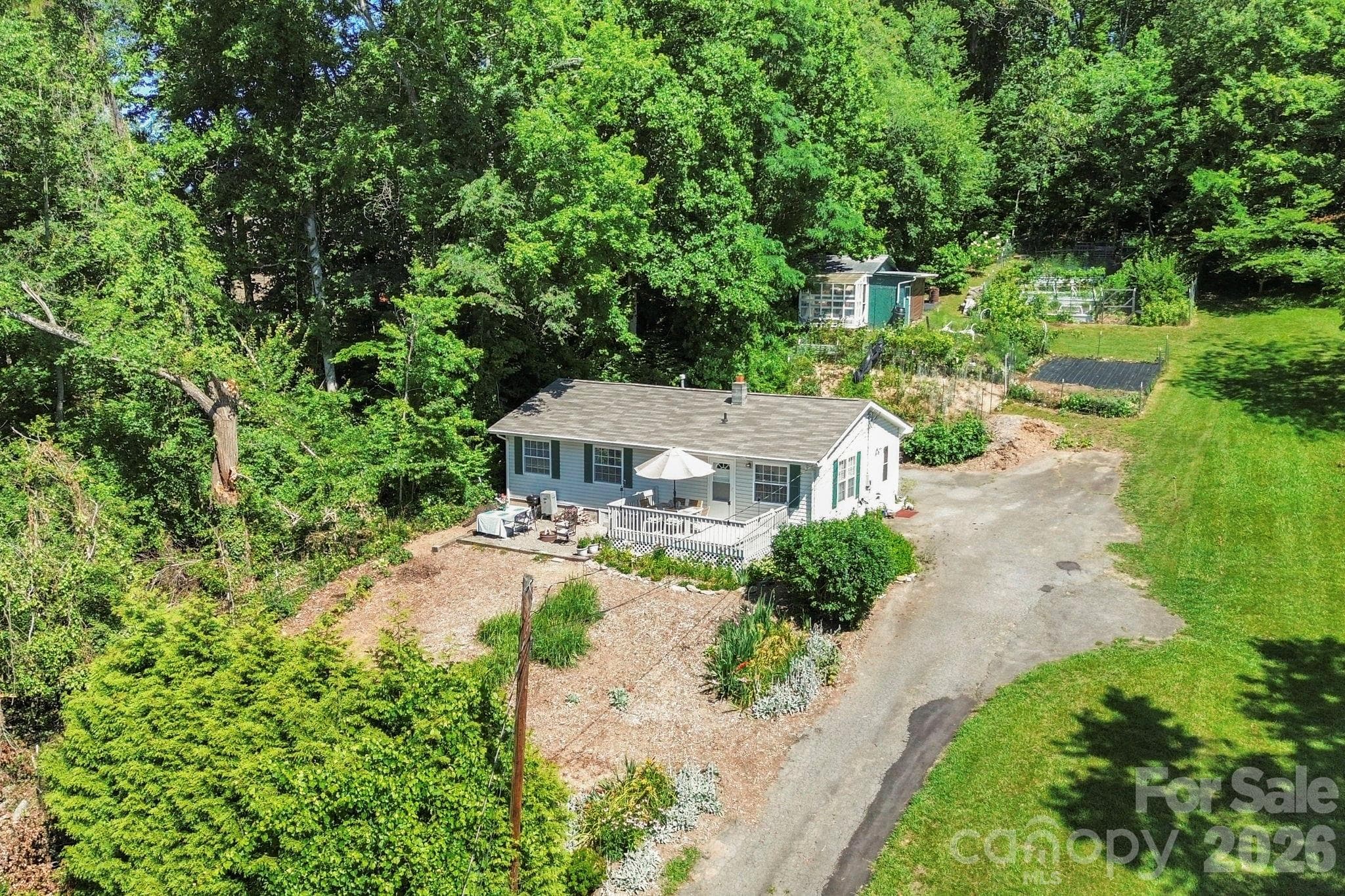 Single Family Residence at 658 Enka Lake Road, Candler, photo 2 of 42