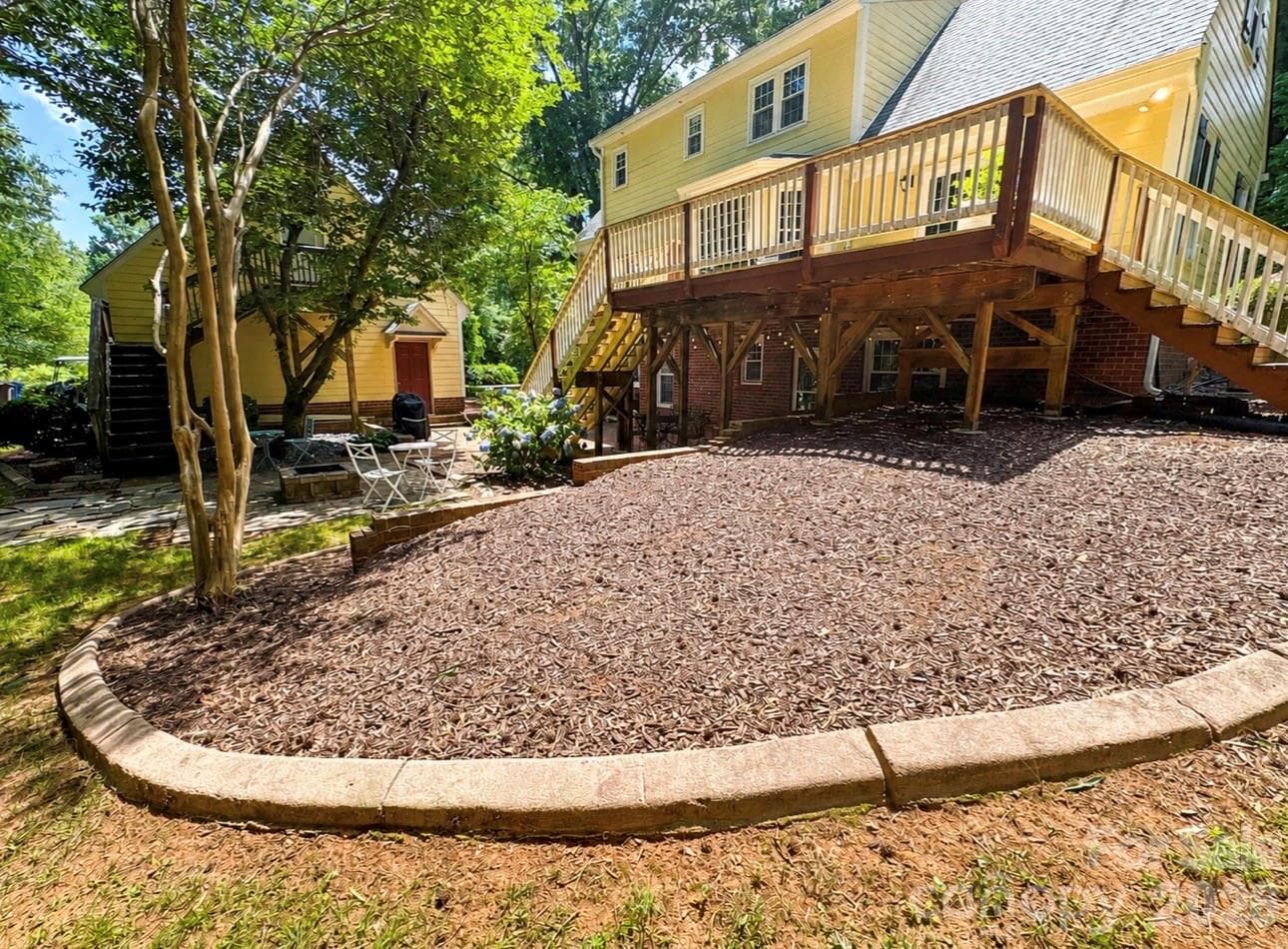 Custom concrete edging on flower beds - 469 Augusta Drive, Statesville