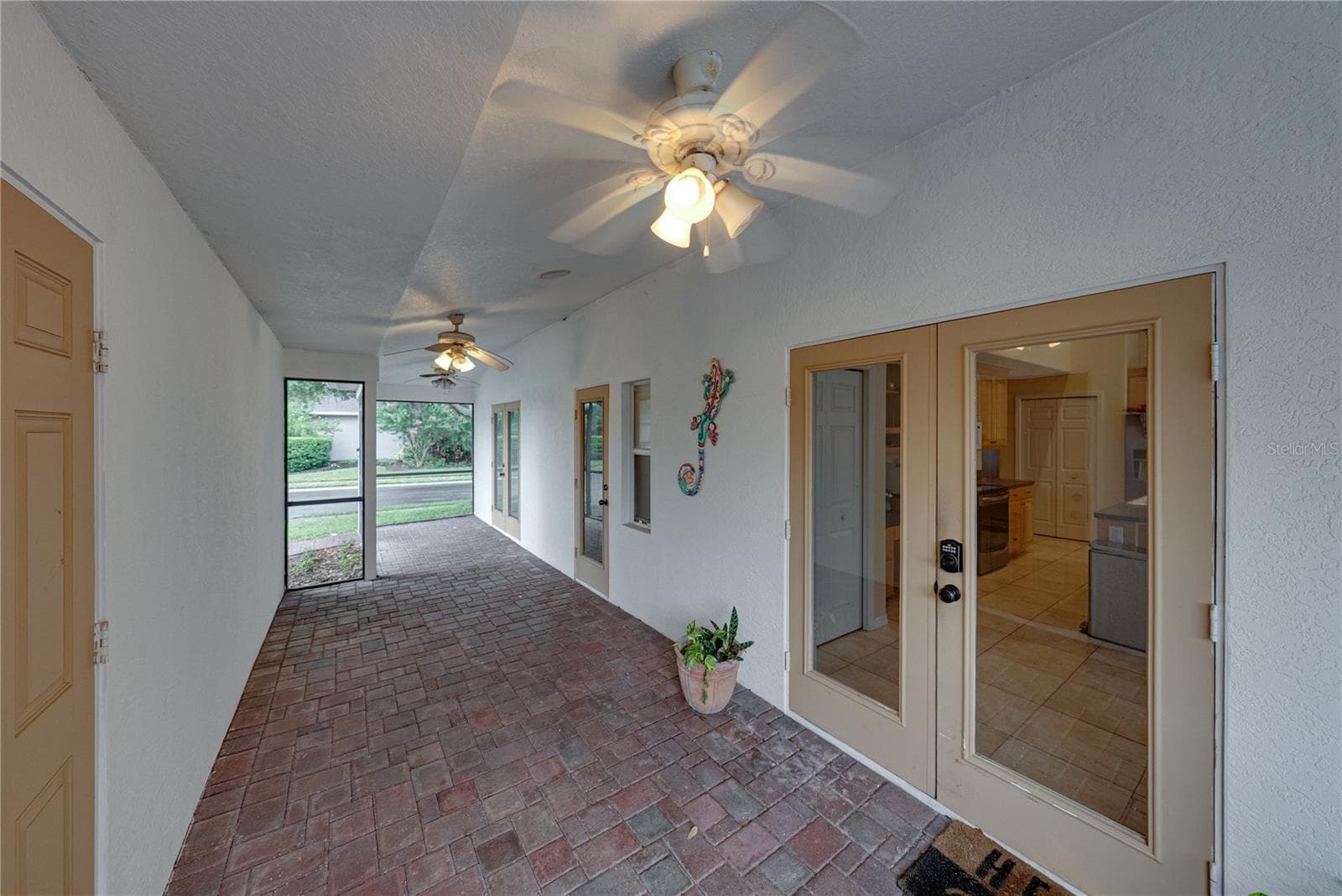 Breezeway between home and detached garage - 2024 LARKSPUR CT, TRINITY