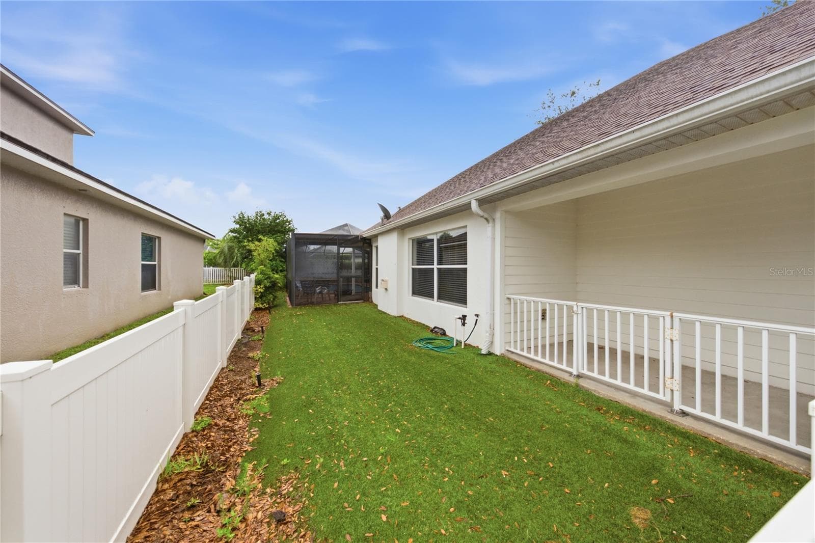 Putting green or dog run along side of home. - 2024 LARKSPUR CT, TRINITY