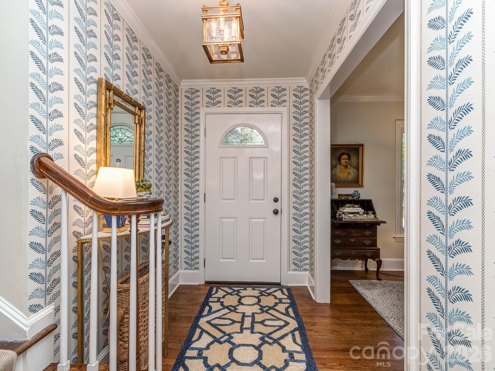 Luxury Foyer light fixture by Visual Comfort & Co - Mykonos.  Nina Campbell wallpaper - Charlotte