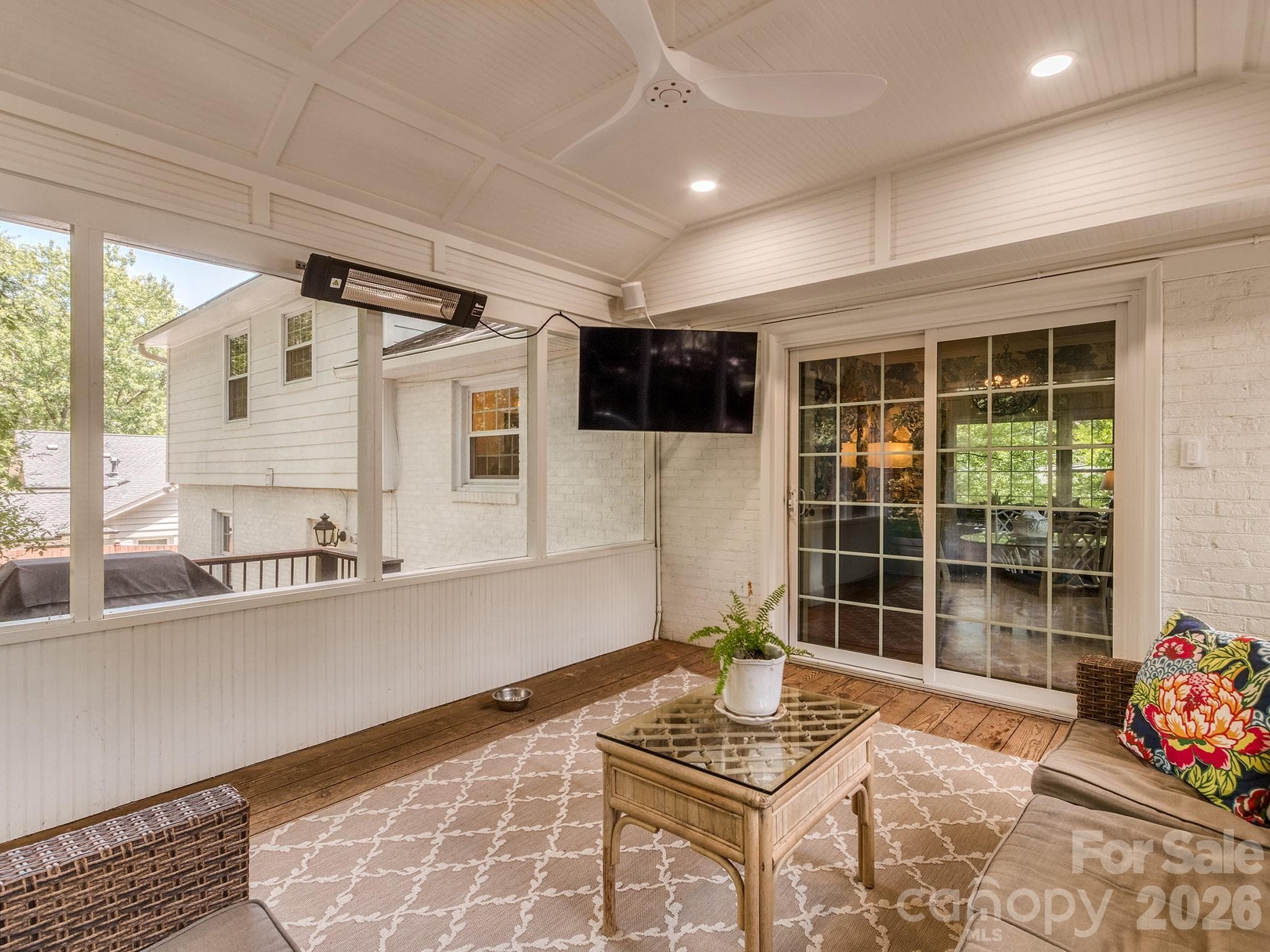 Updated screened in patio with recessed lights, fan, and heaters - Charlotte