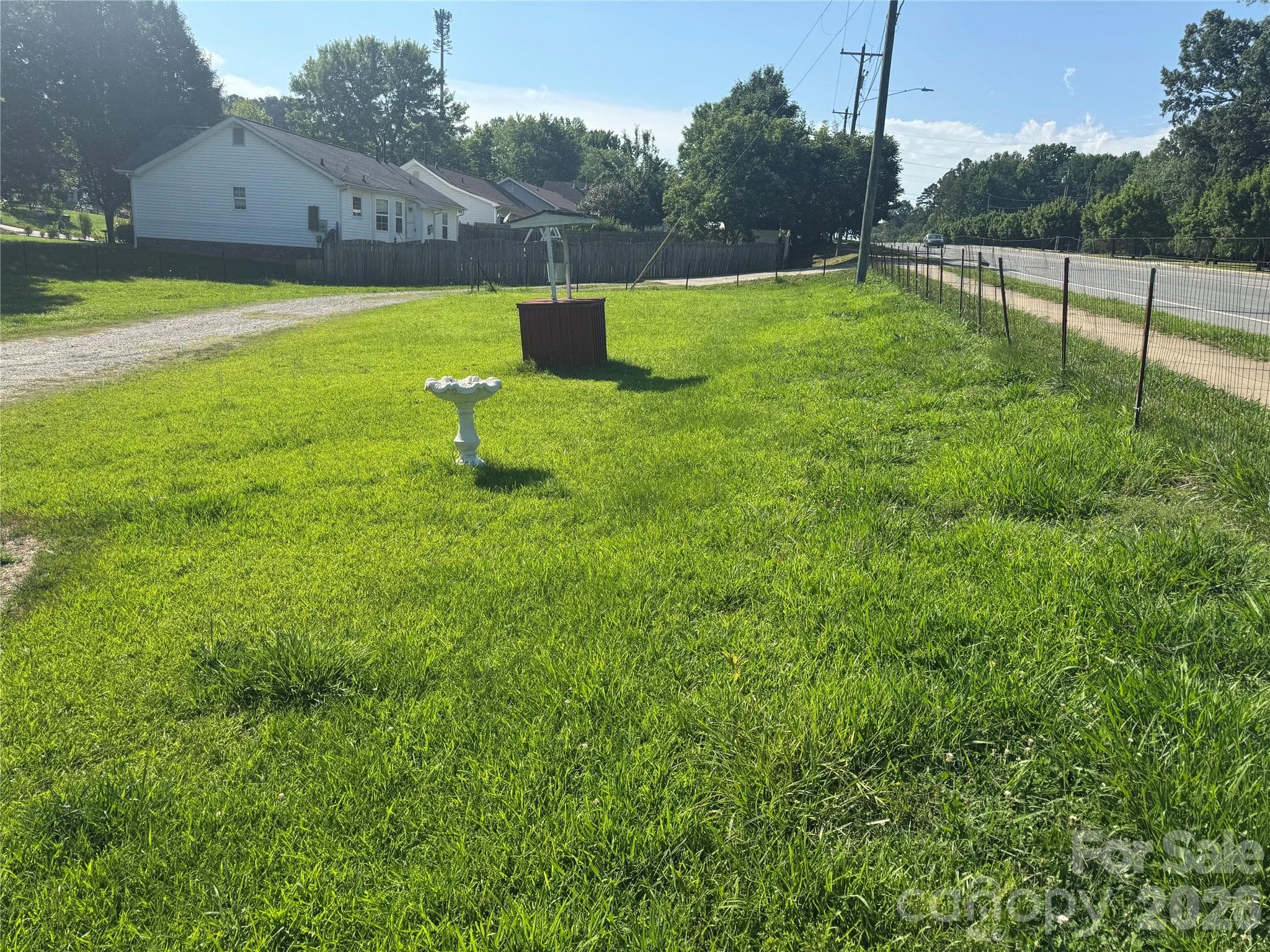 The home sits on close to an acre of land - Charlotte