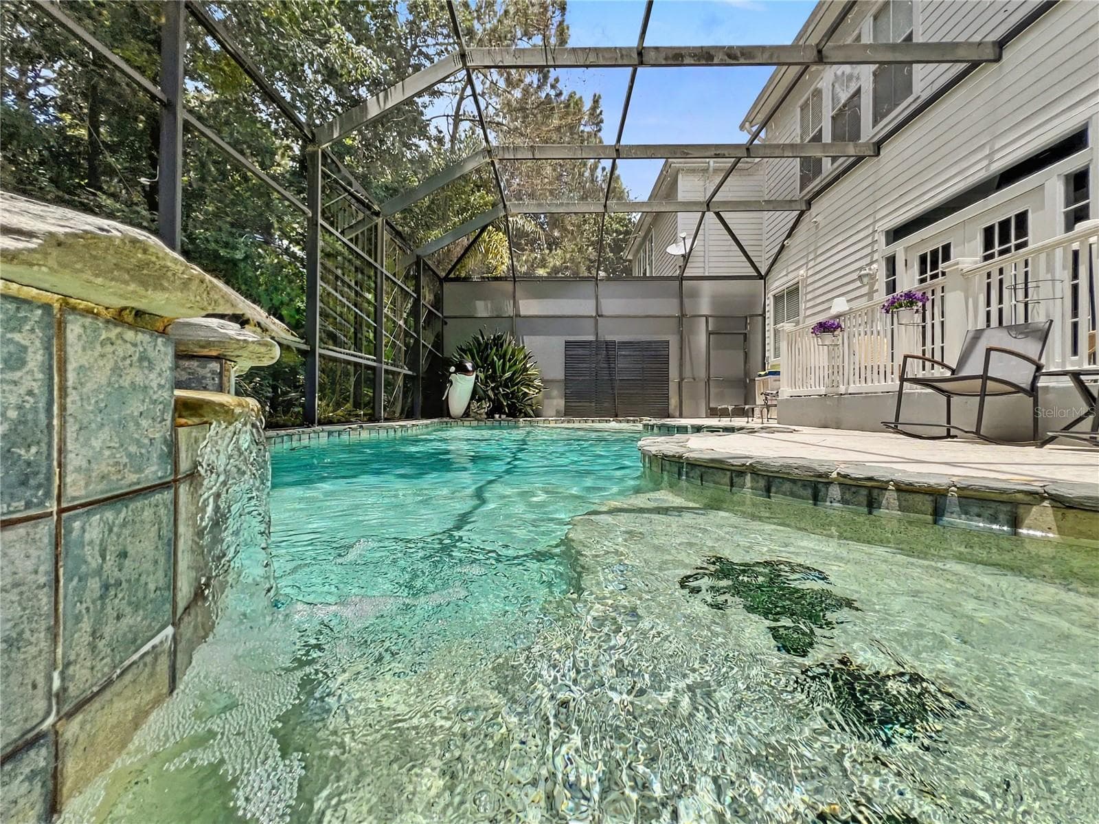 Decorative platforms with turtle designs by waterfall spa - 816 RUNNER OAK ST, CELEBRATION