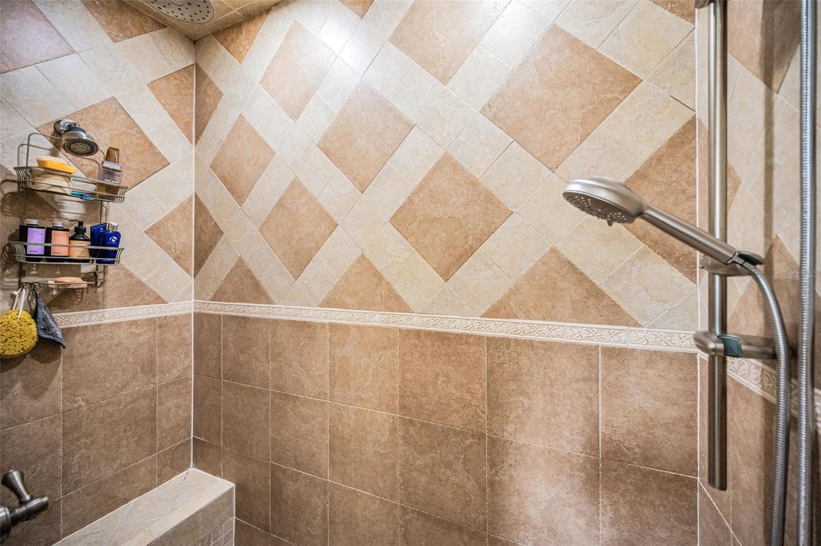 Shower with built in bench and steam room. - 732 NE OAK ST, ST PETERSBURG