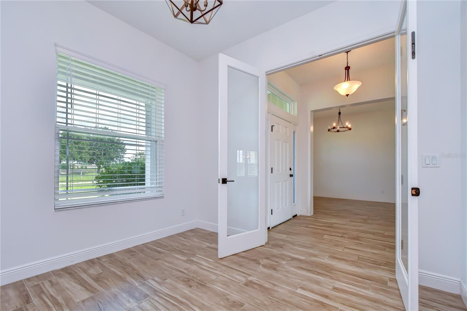 Elegant French door entry providing privacy and style. - 4008 MCINTOSH ESTATES LN, PLANT CITY
