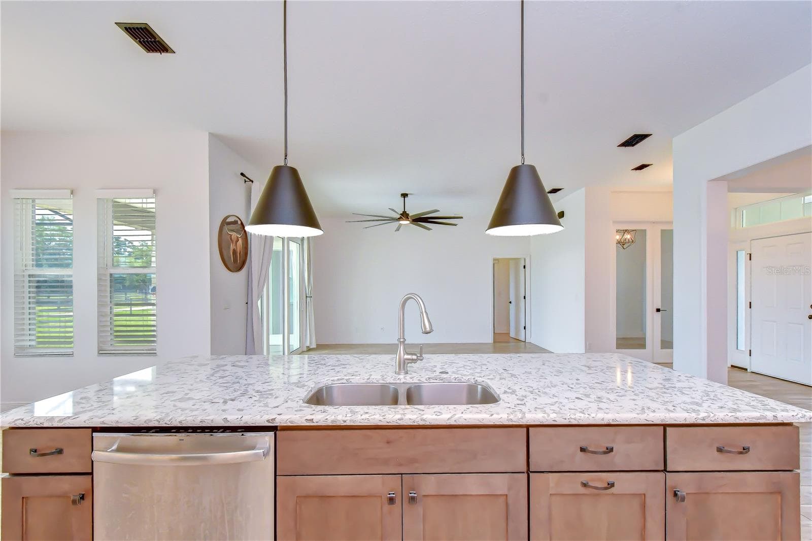 Large center island with double sink and ample prep space. - 4008 MCINTOSH ESTATES LN, PLANT CITY