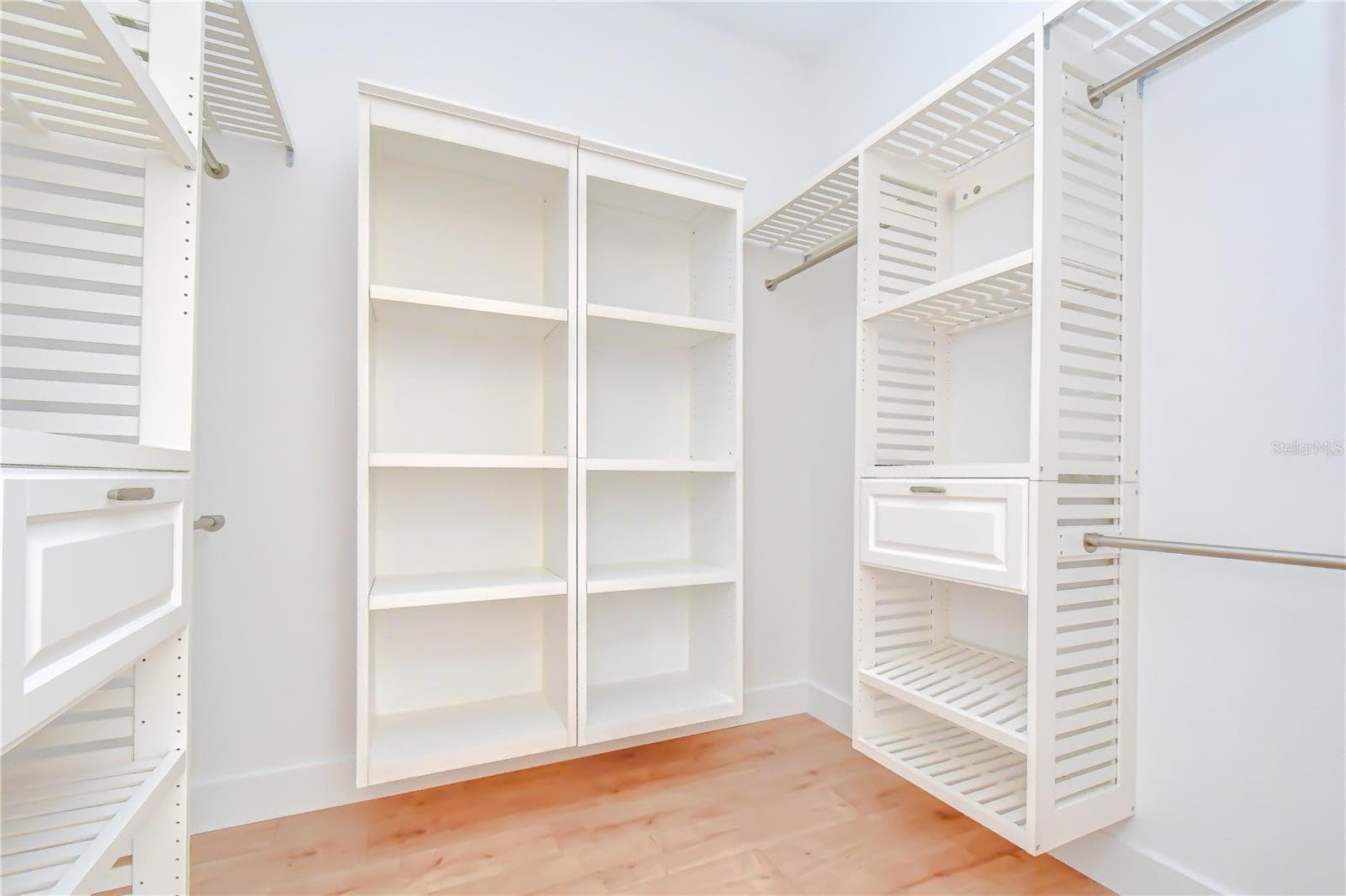 Professionally designed closet maximizing organization and storage. - 4008 MCINTOSH ESTATES LN, PLANT CITY