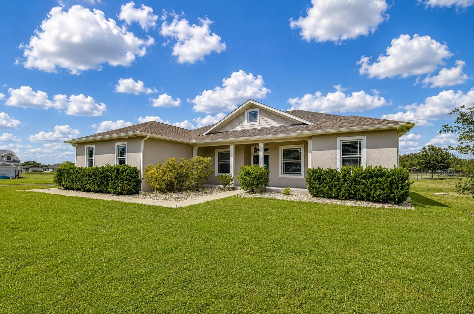 Charming architectural design with welcoming front porch and timeless curb appeal. - 4008 MCINTOSH ESTATES LN, PLANT CITY