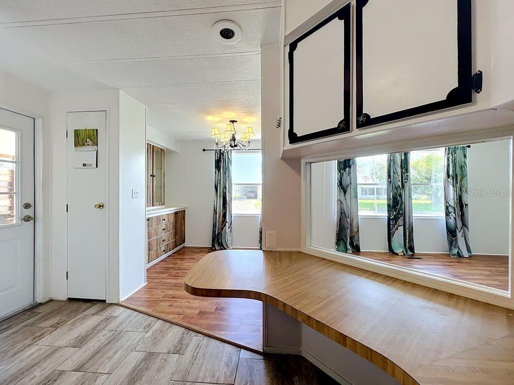 Breakfast bar and dining room - 1203 APACHE CIR, TAVARES