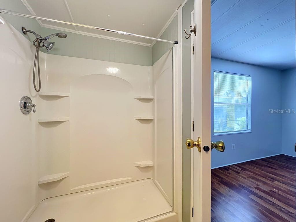 2nd bath opens to 2nd bedroom - 1203 APACHE CIR, TAVARES