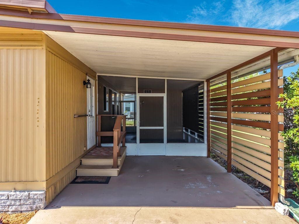 Carport and Entrance - 1203 APACHE CIR, TAVARES